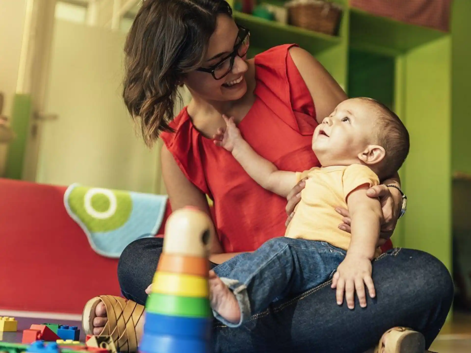 a person holding a baby