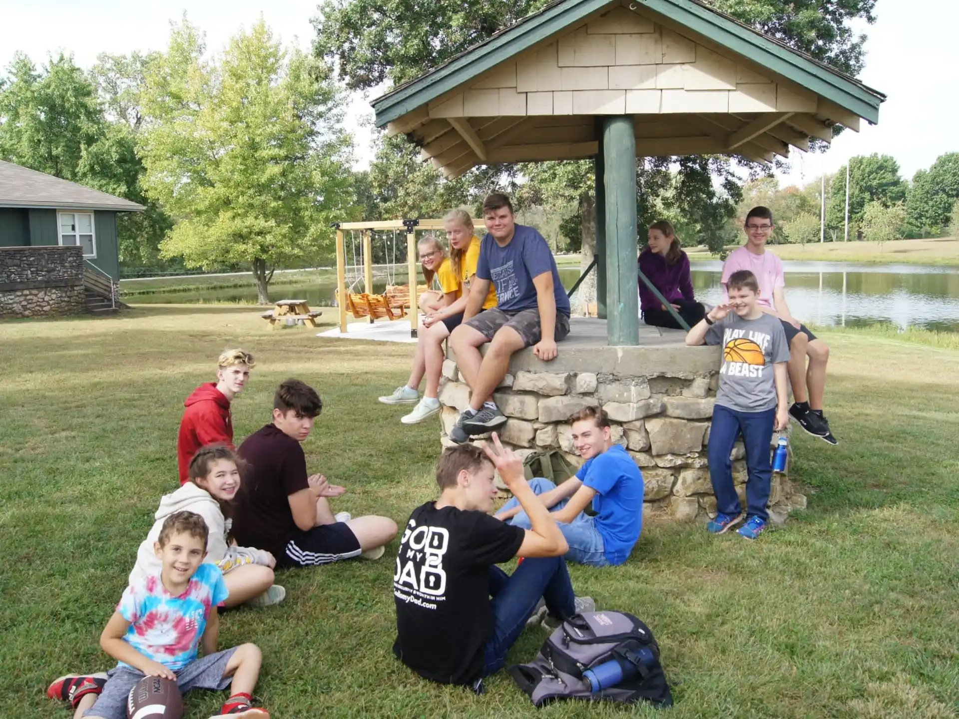 a group of people sitting on a bench