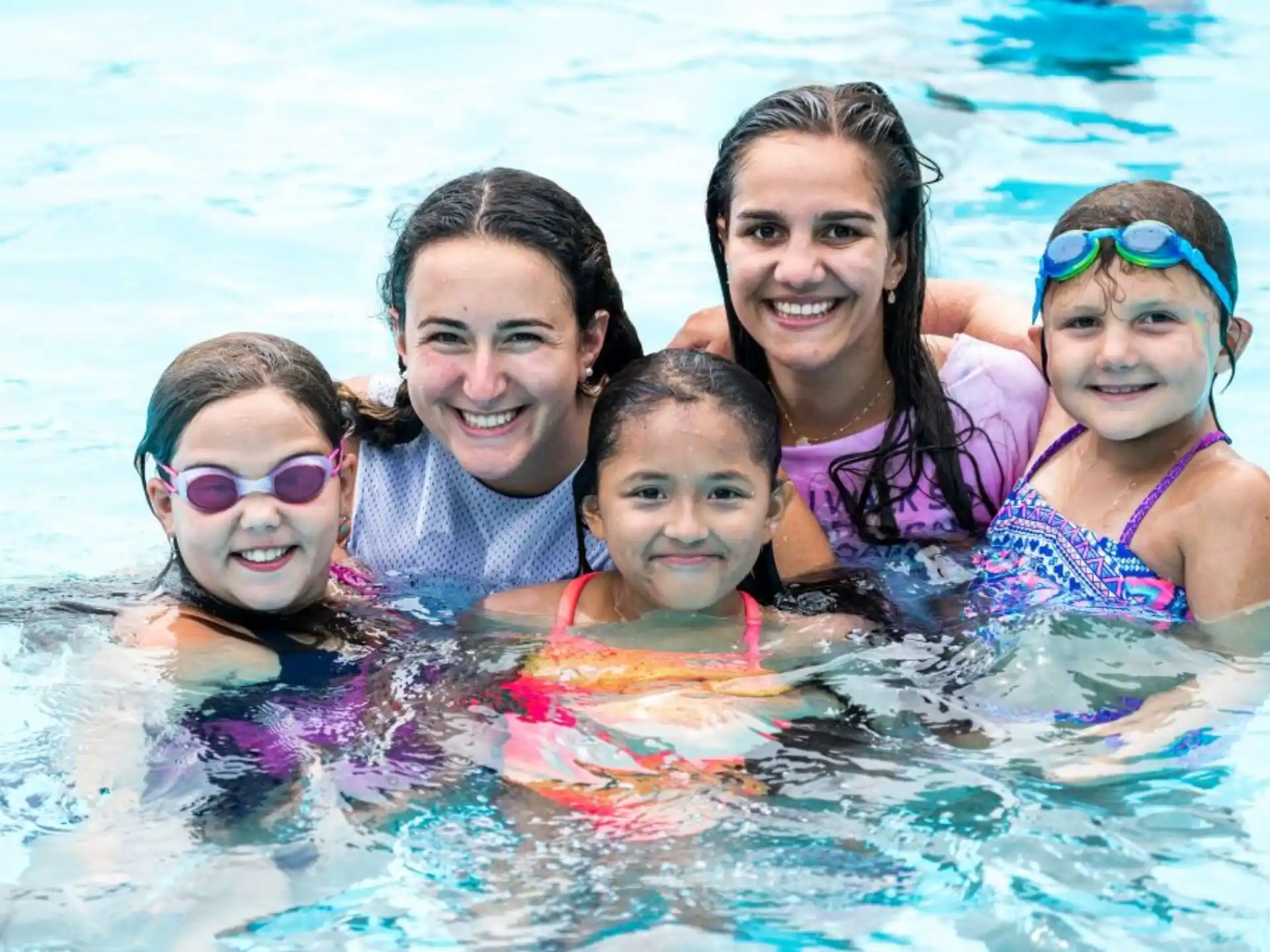 a group of people in a pool