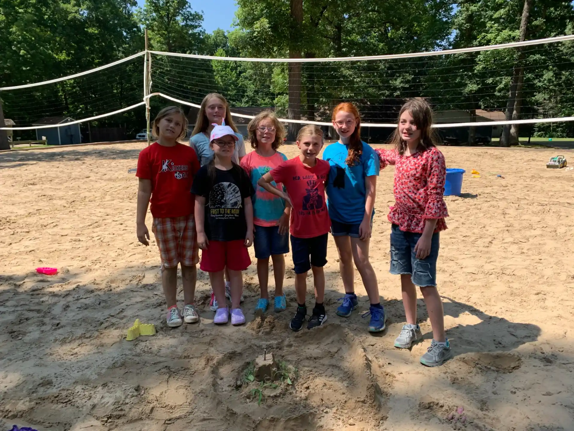 a group of children posing for a photo