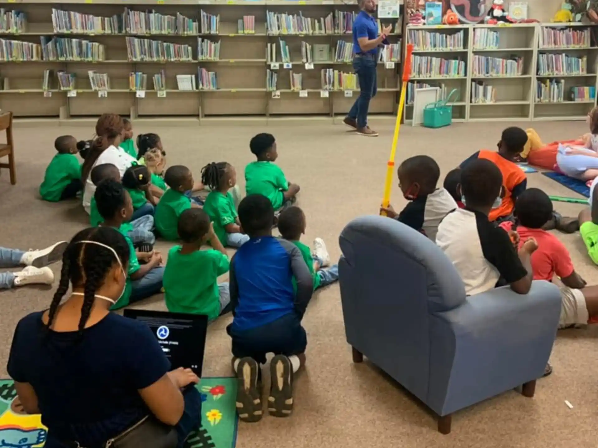 a group of children in a library