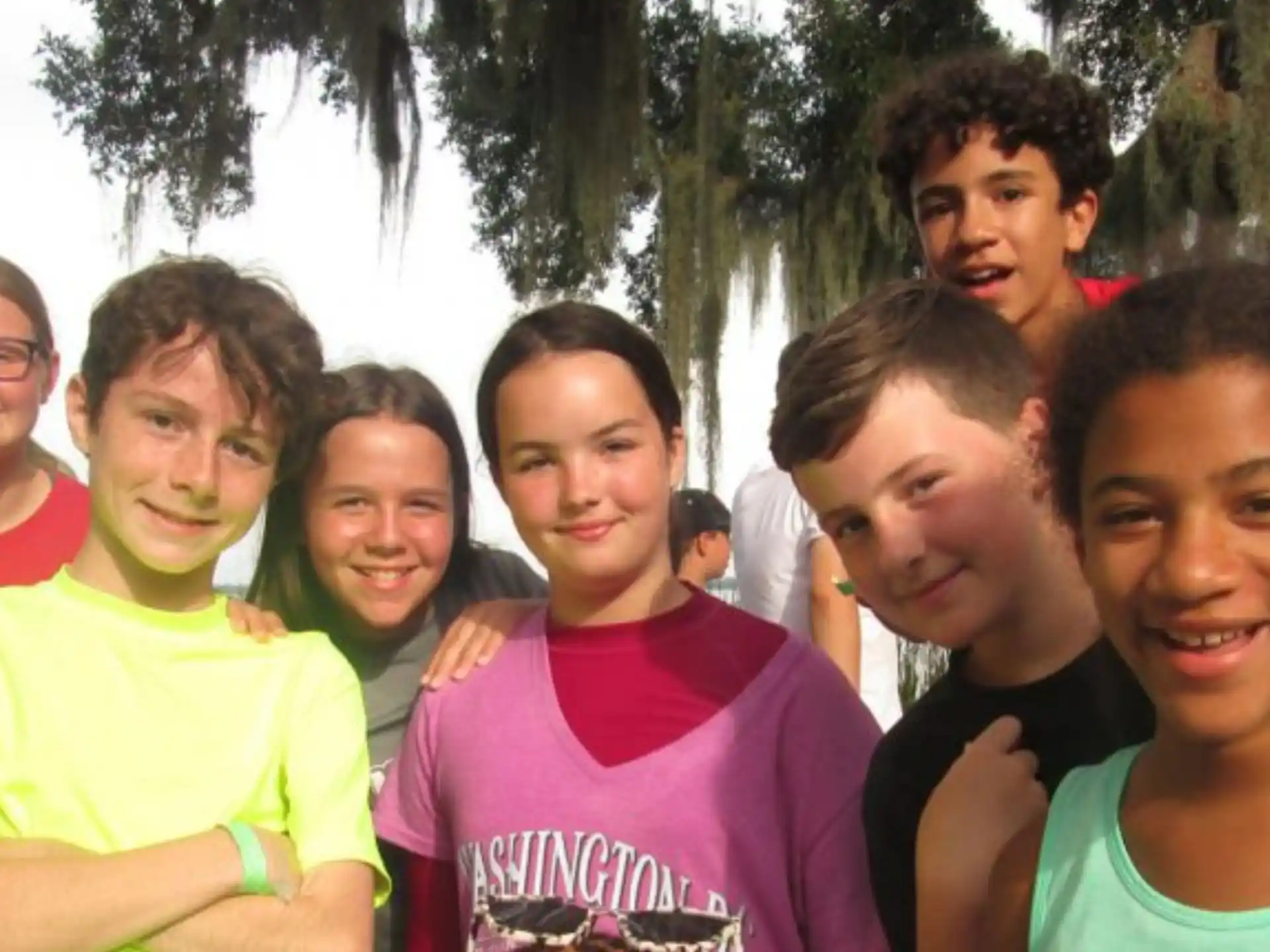 a group of people posing for a photo