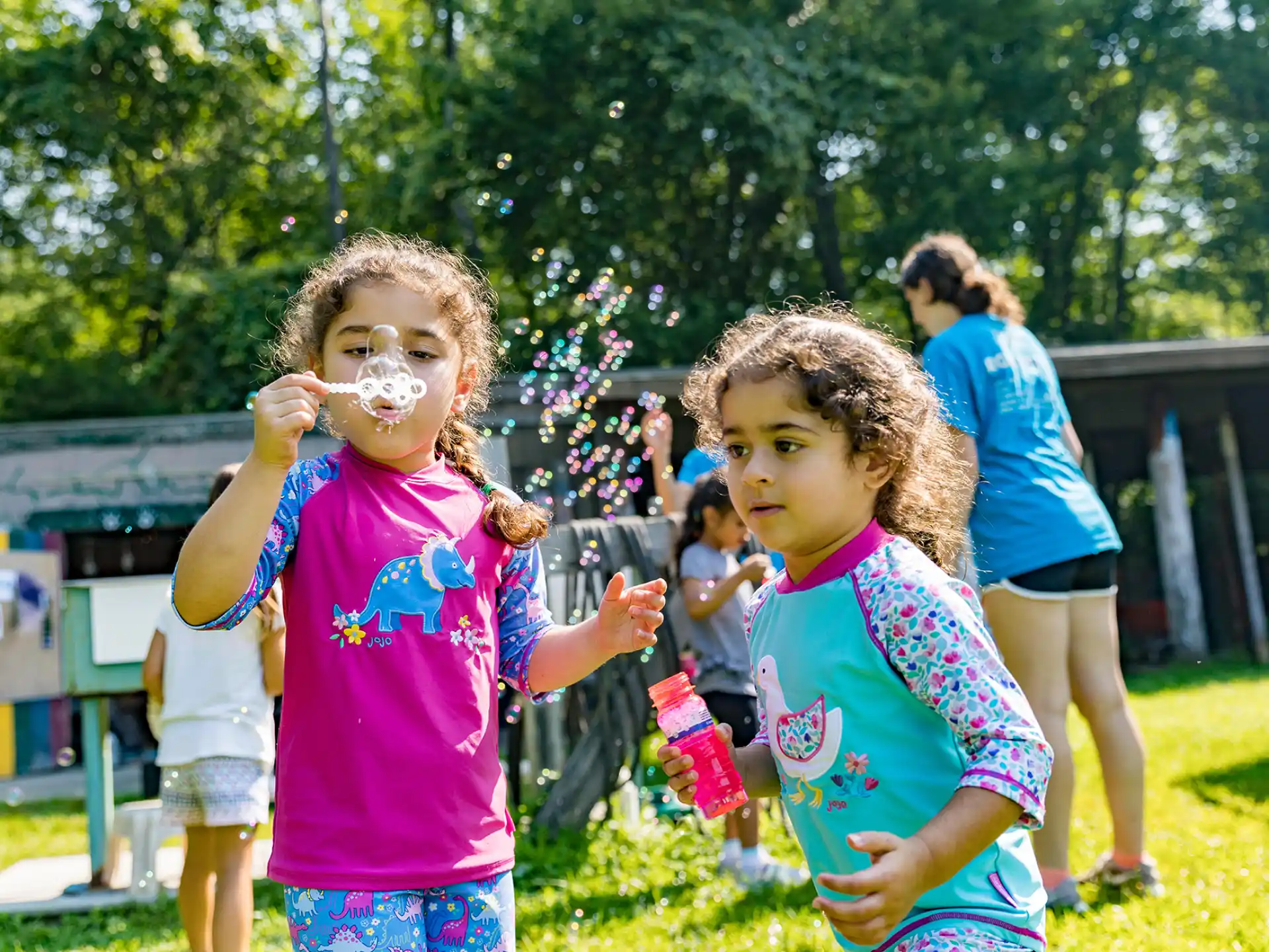 a group of children playing in a playground