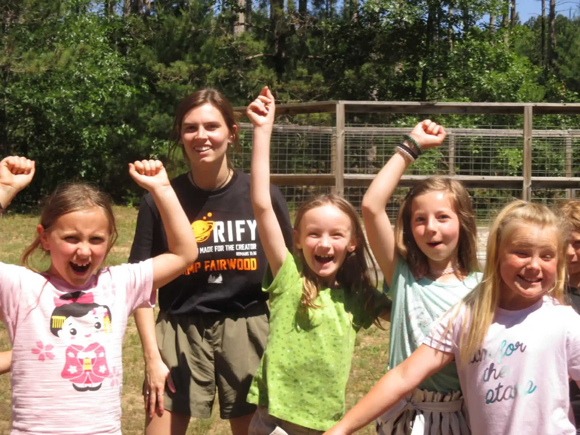 a group of girls posing for a photo