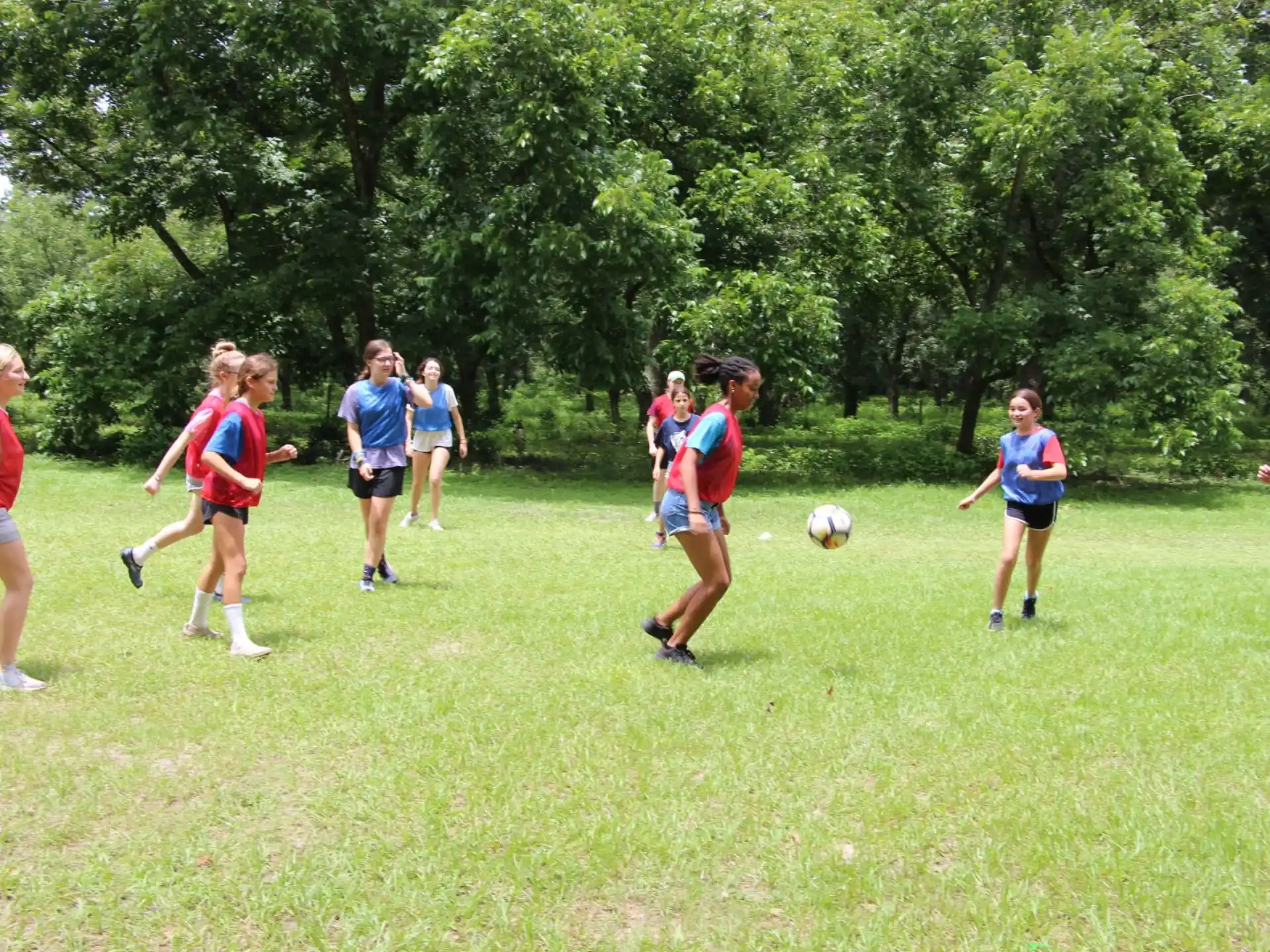 a group of people playing football