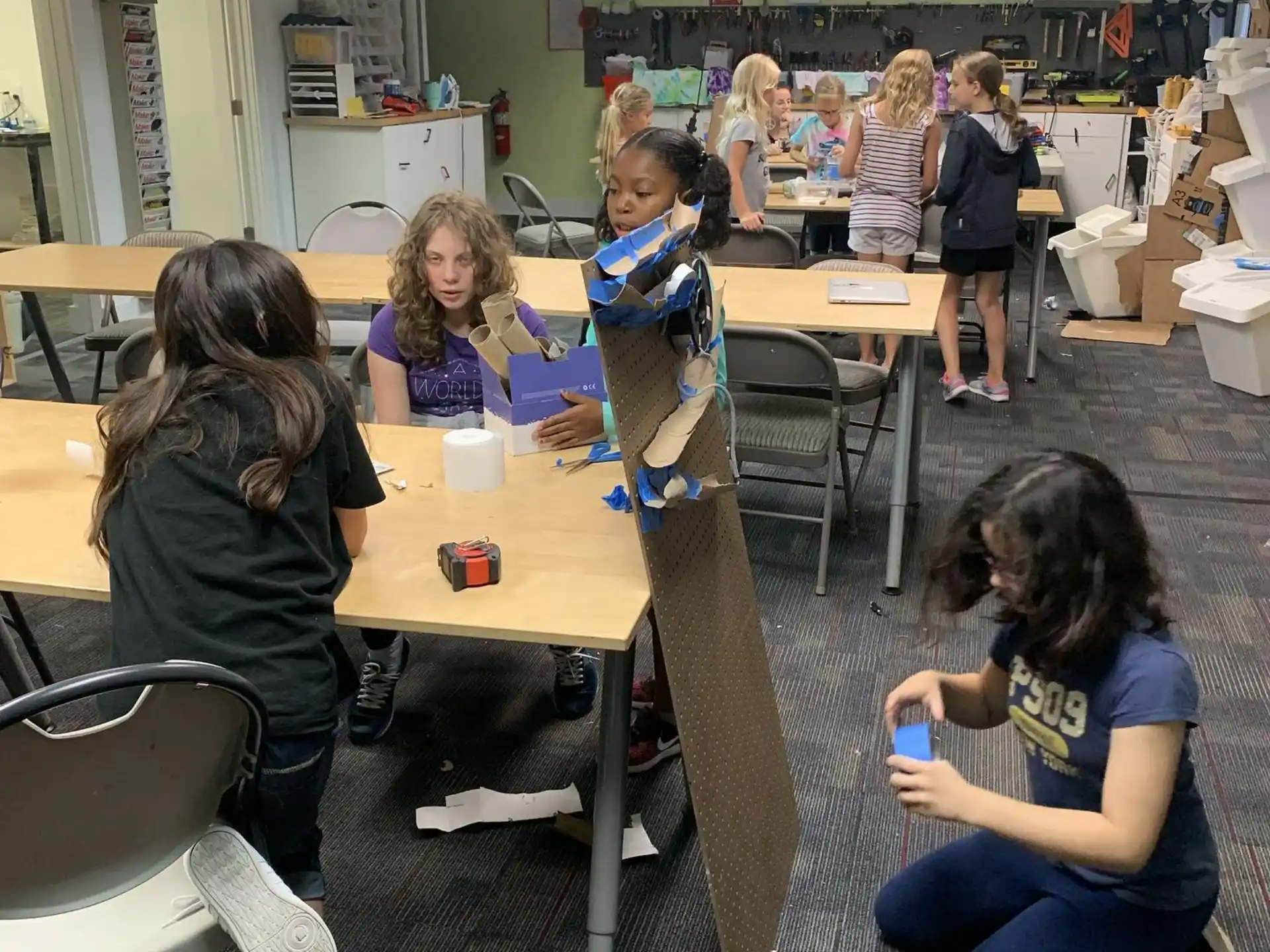 a group of people sitting at a table