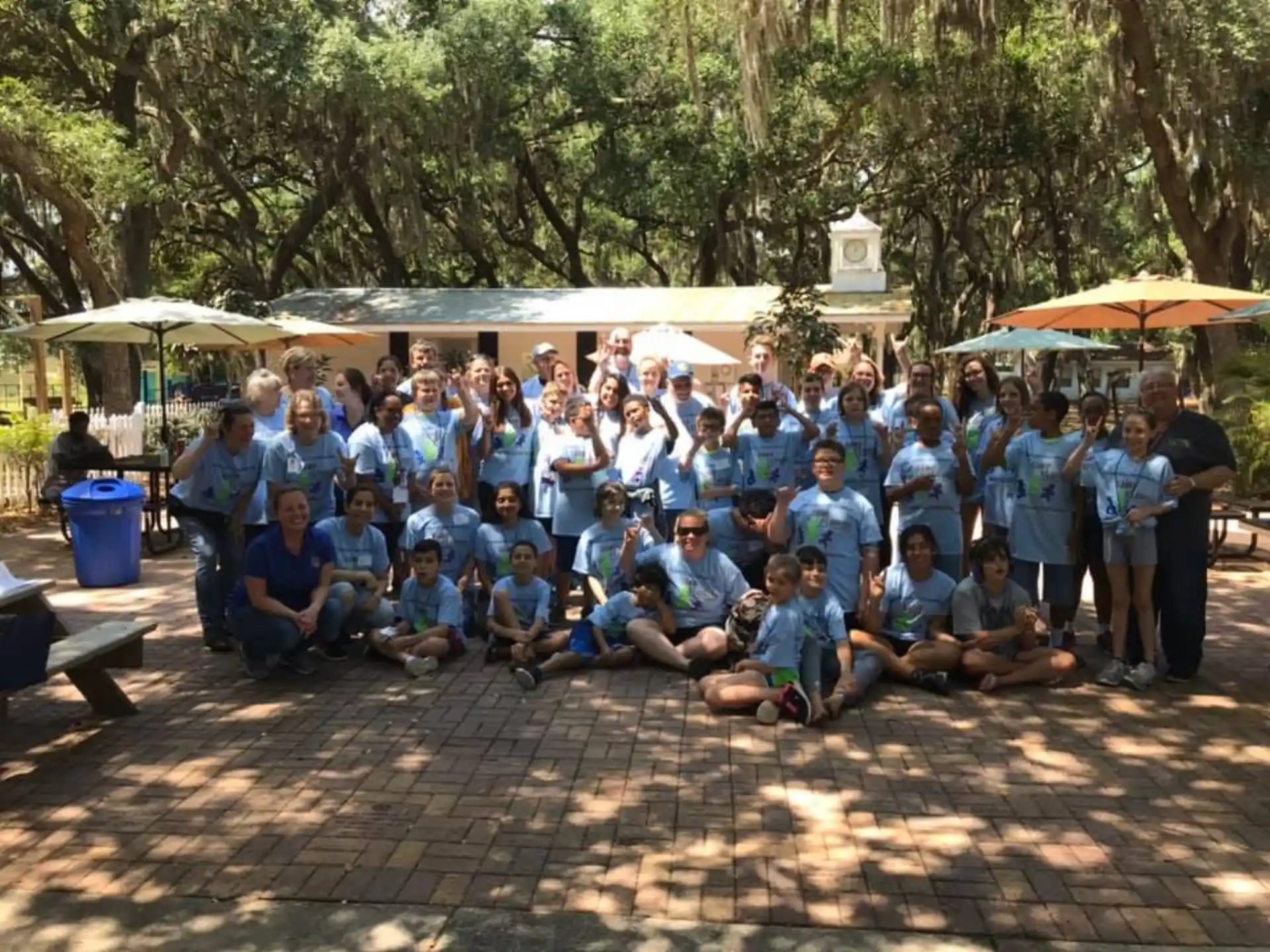 a group of people posing for a photo