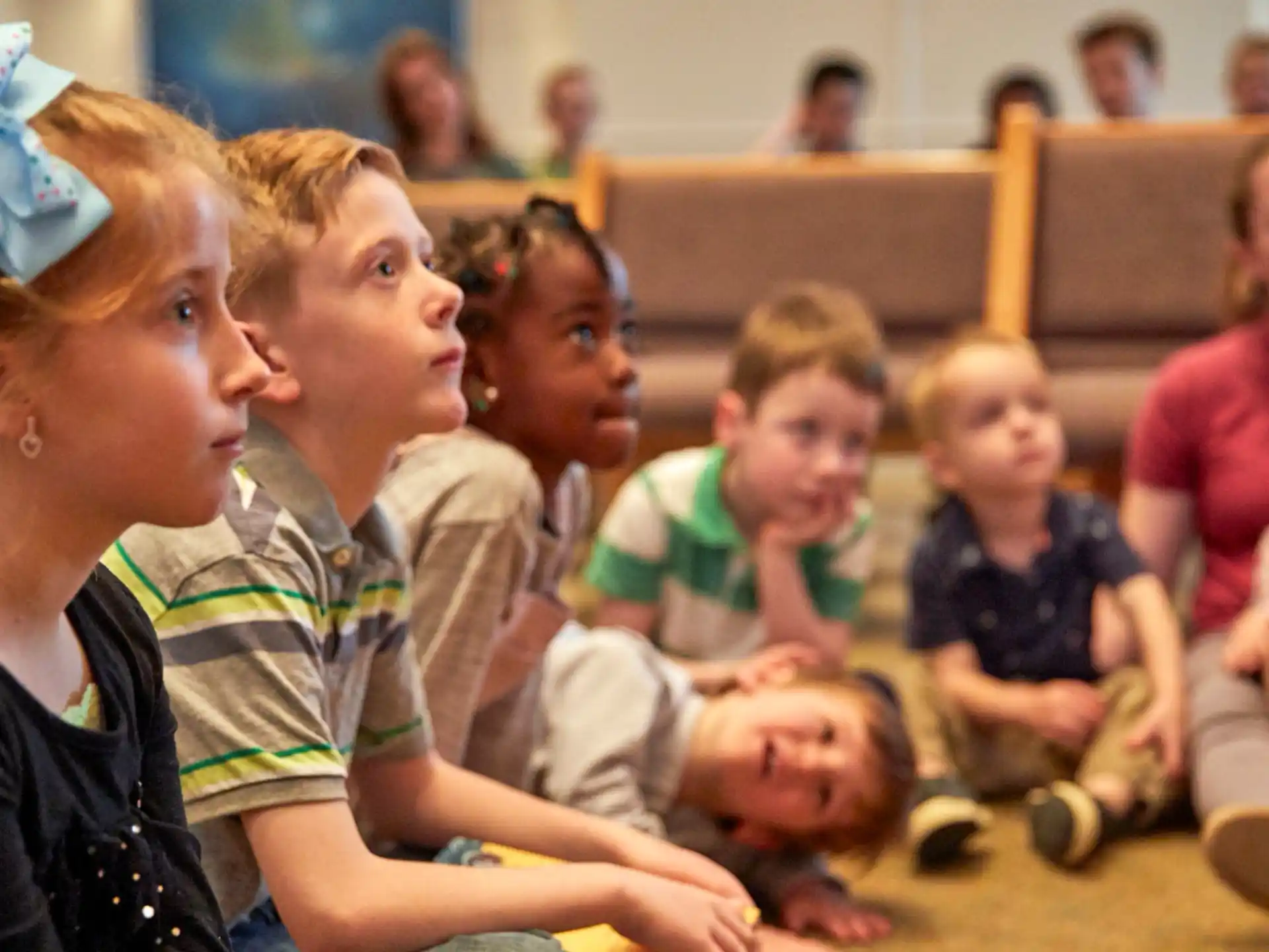 a person and a group of children