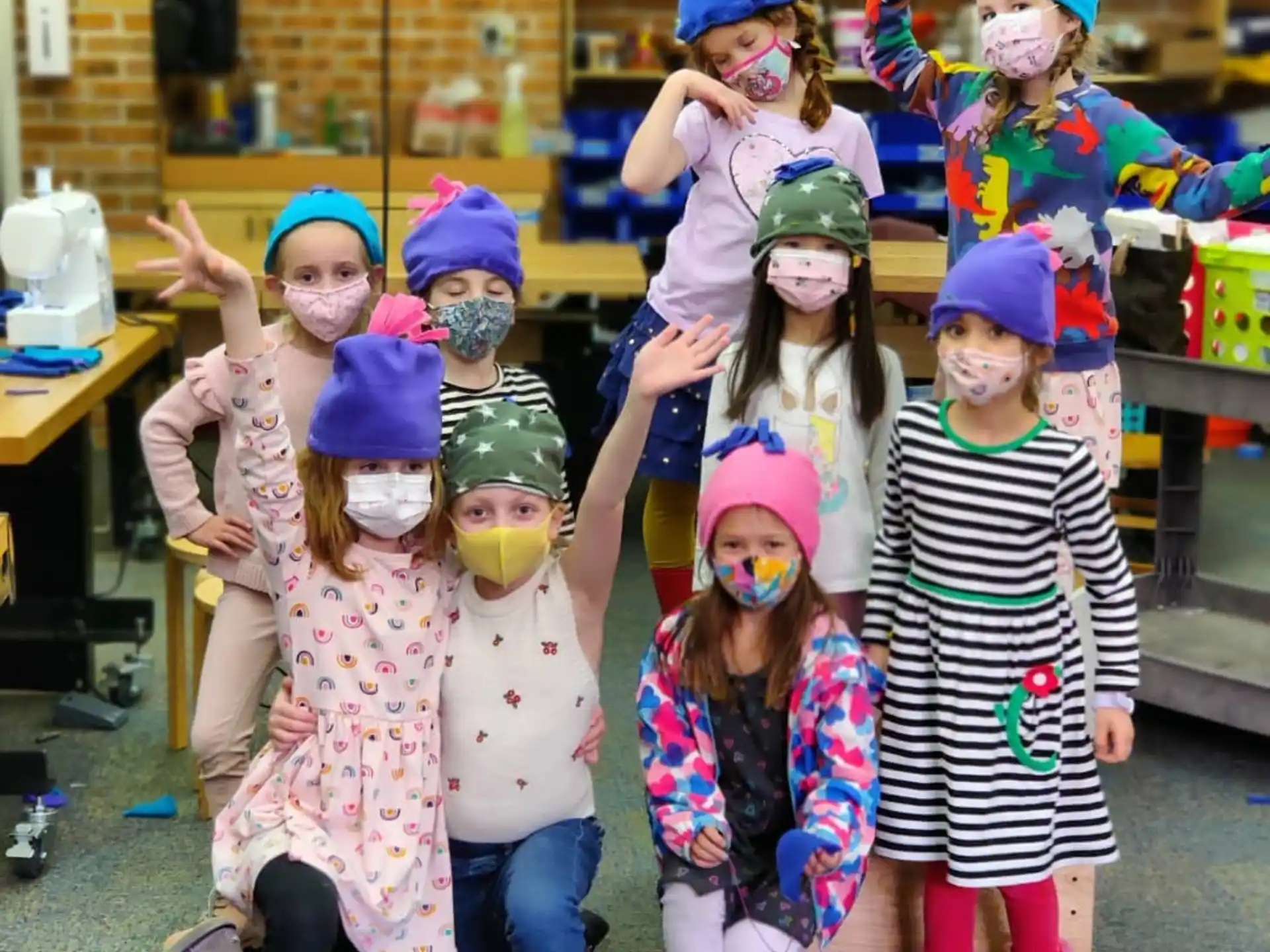 a group of children wearing clothing