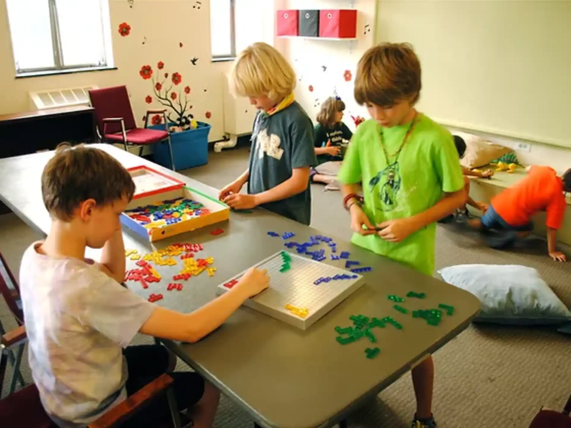 a group of children playing a board game