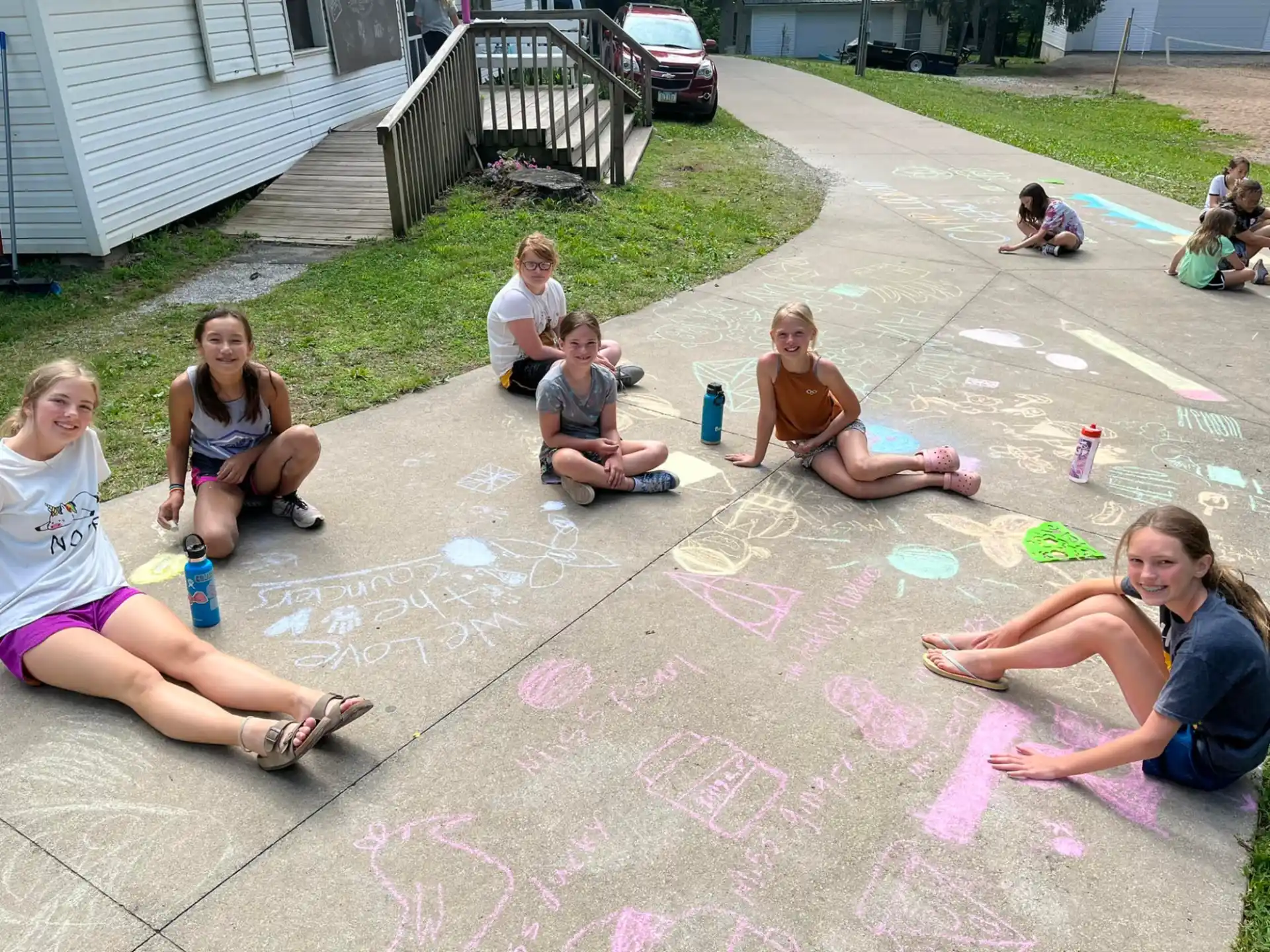 a group of people sitting on the ground