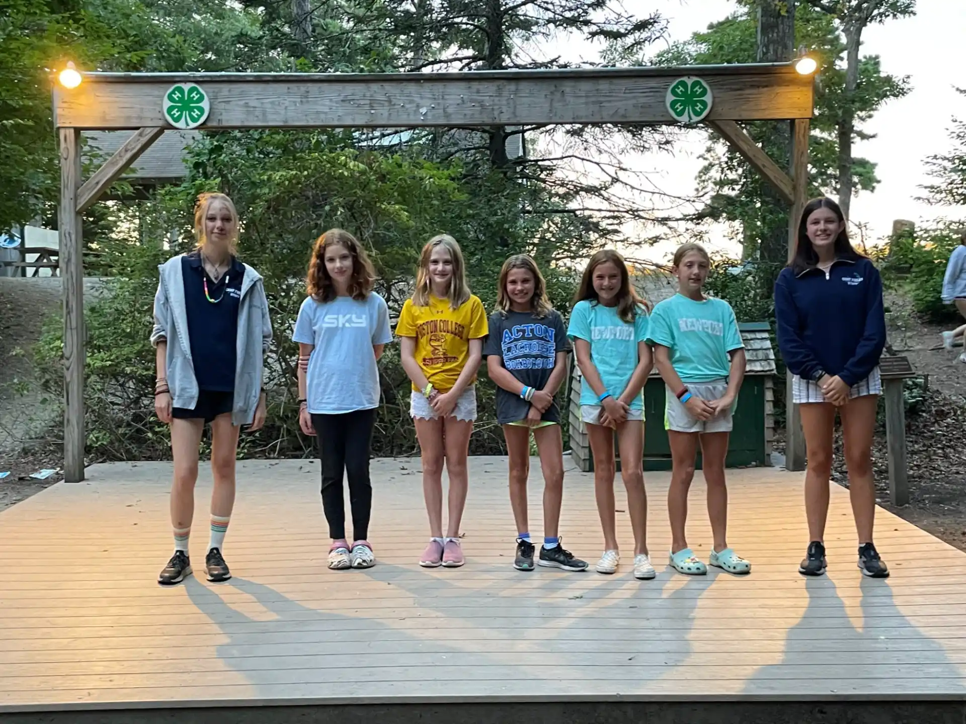 a group of girls posing for a photo