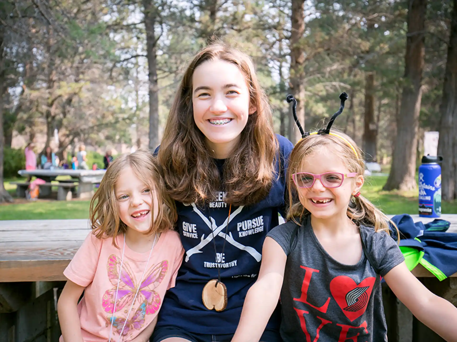 a person and two girls