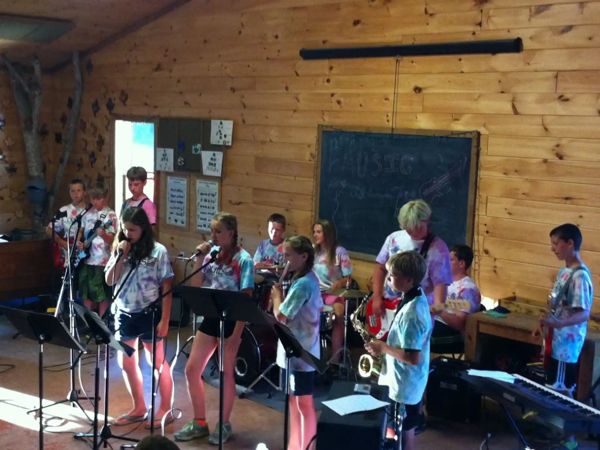 a group of kids playing instruments