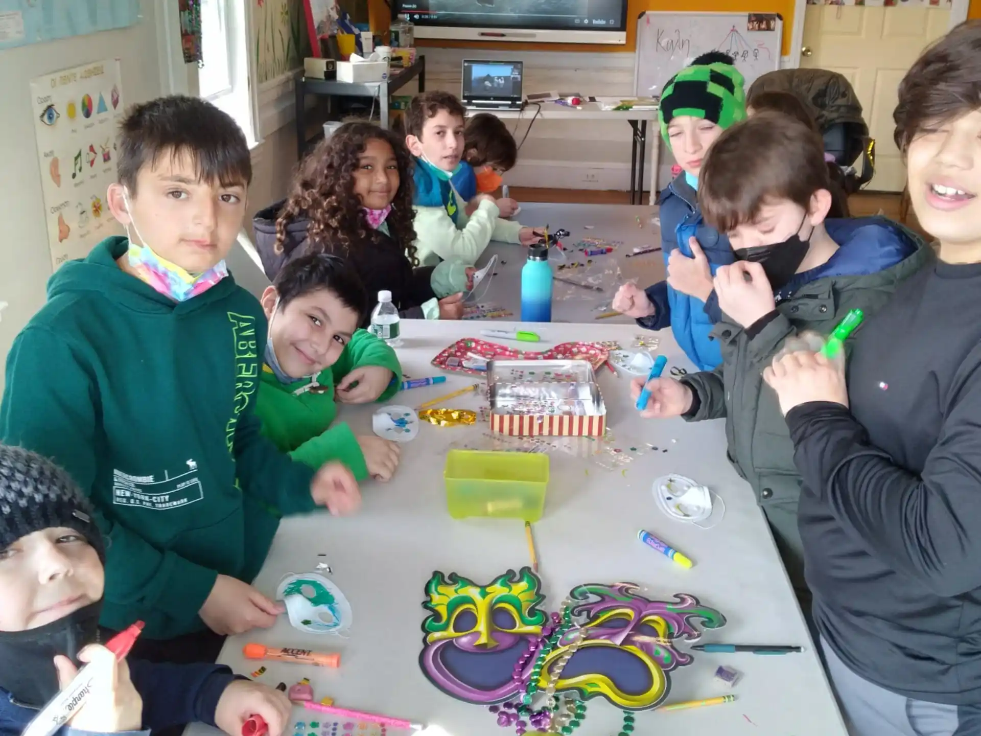 a group of children playing a board game