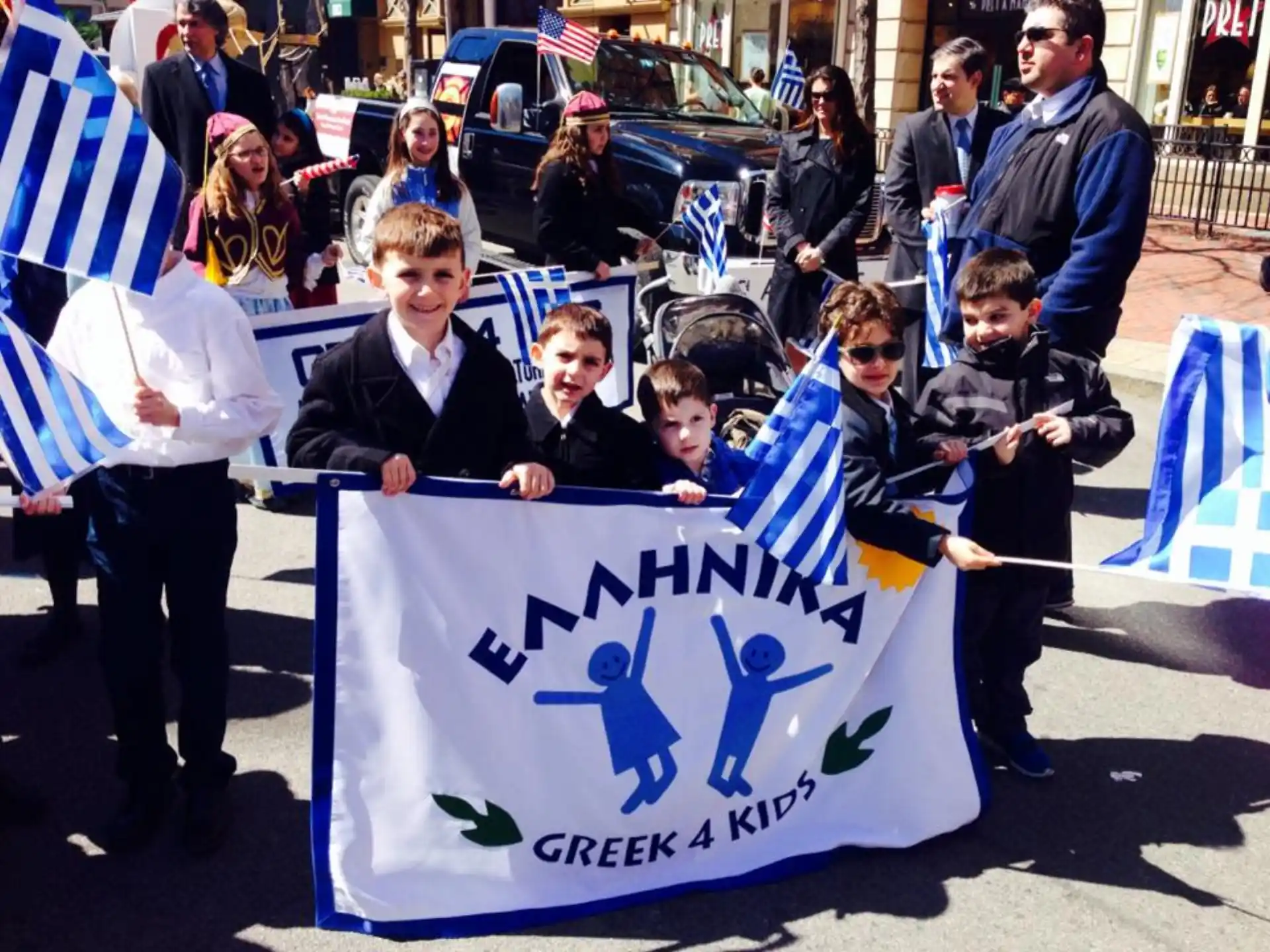 a group of people holding a sign