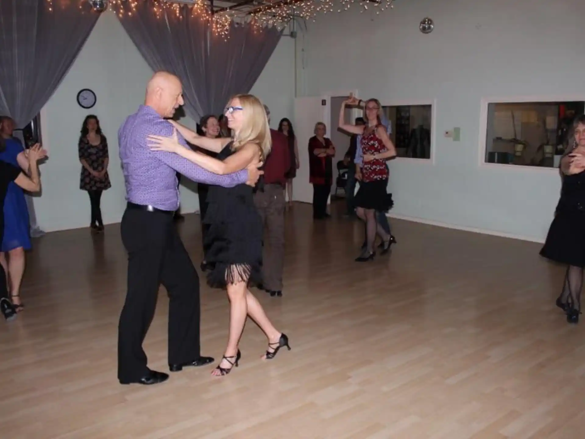 a man and woman dancing