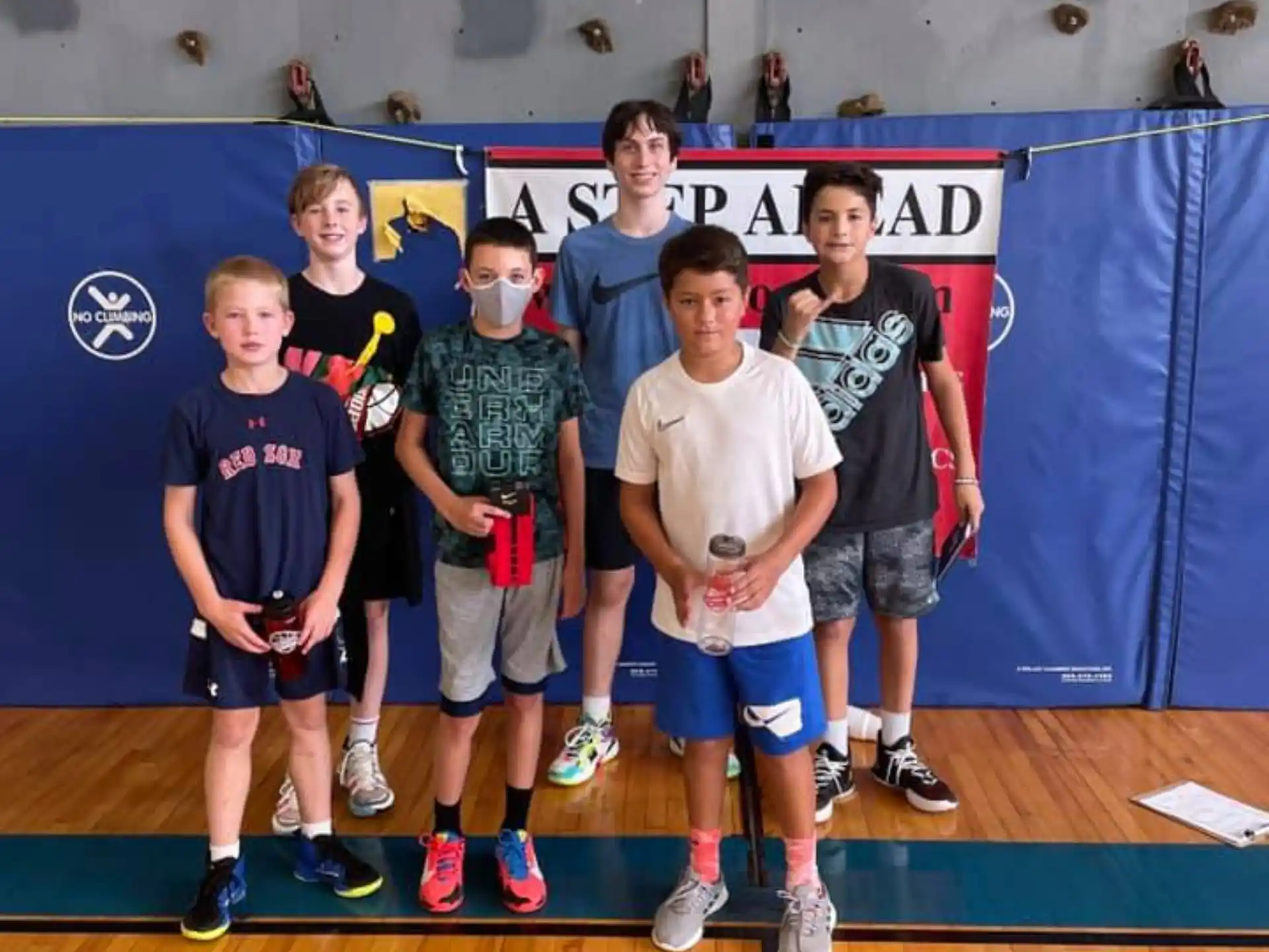 a group of boys posing for a photo