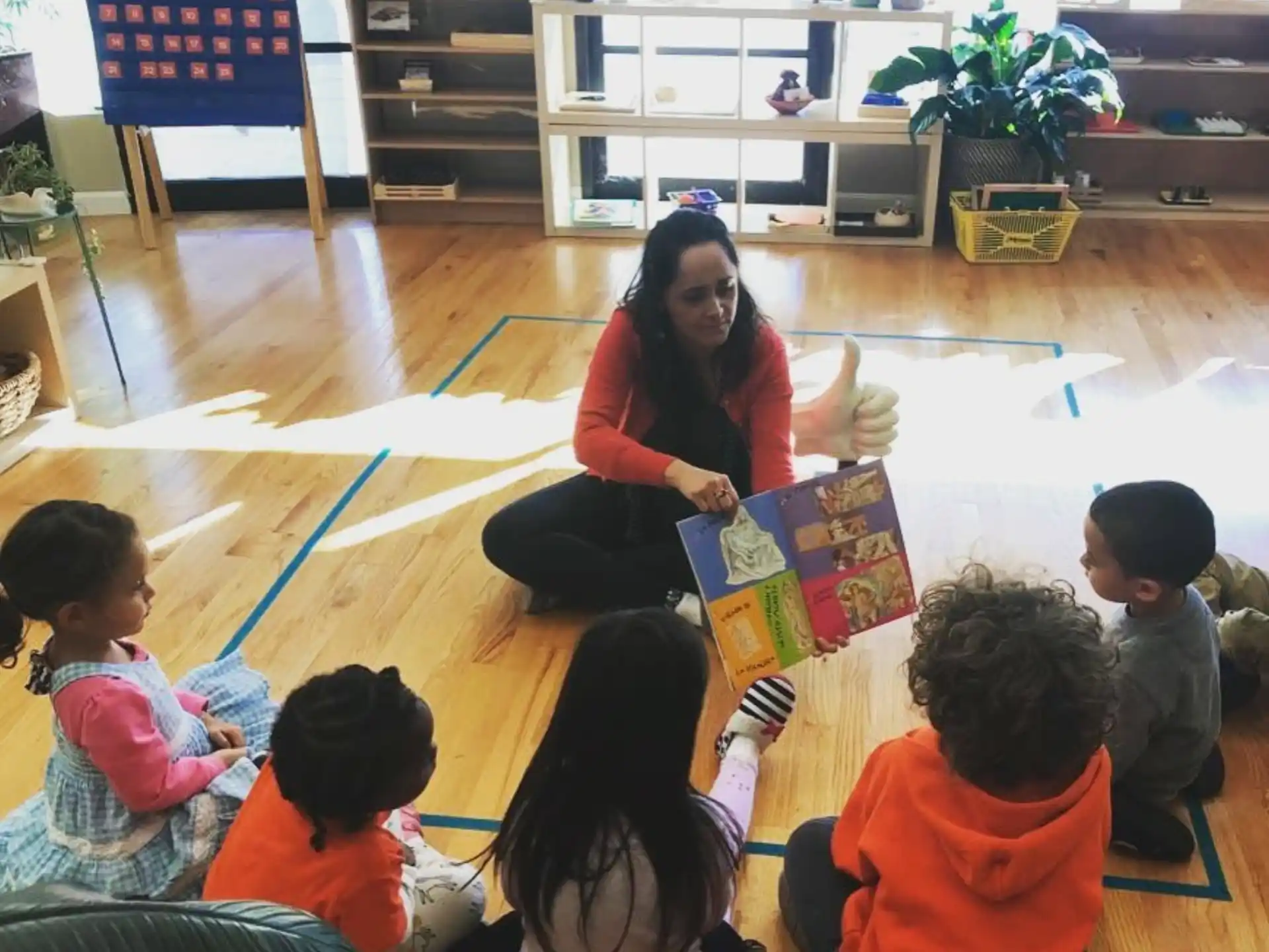 a person teaching children in a classroom