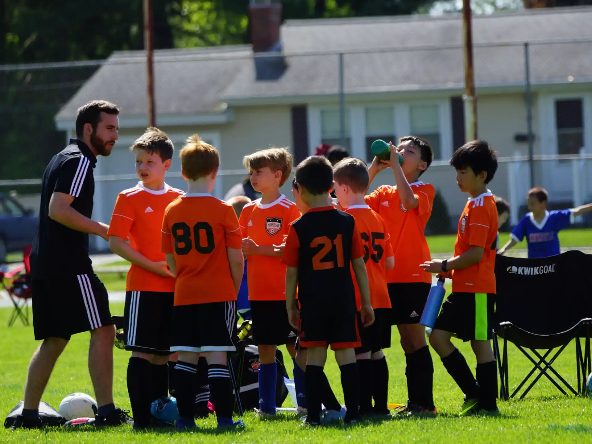 a group of boys in football uniforms