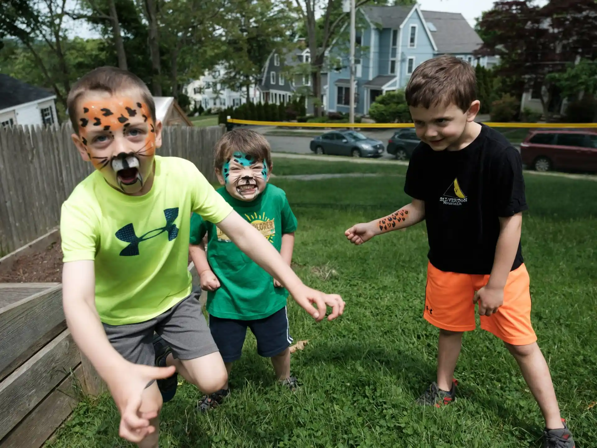 a group of boys with painted faces