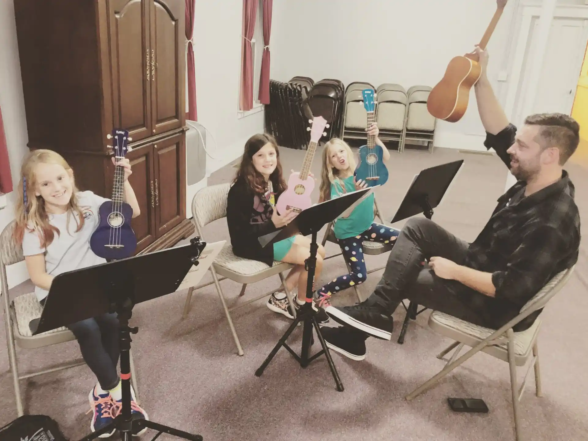 a group of people sitting in chairs