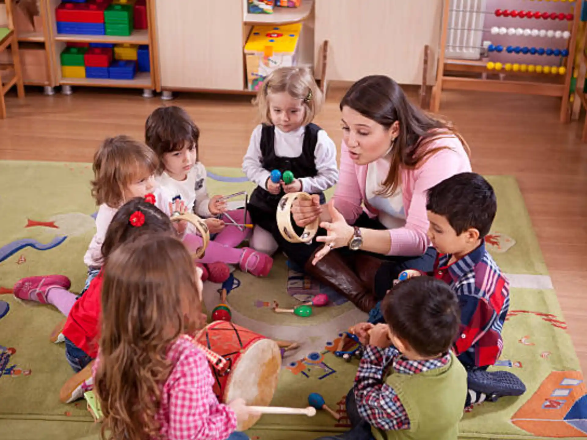 a group of children sitting on the floor
