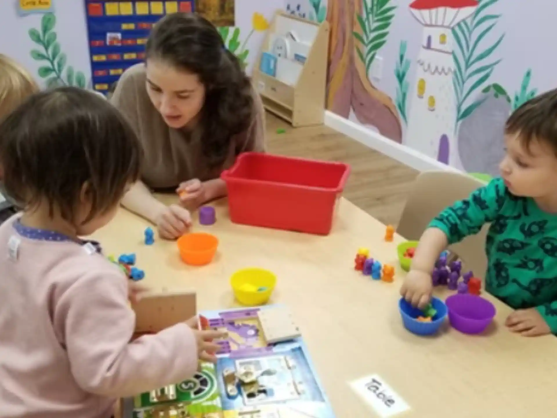 a group of children playing with toys