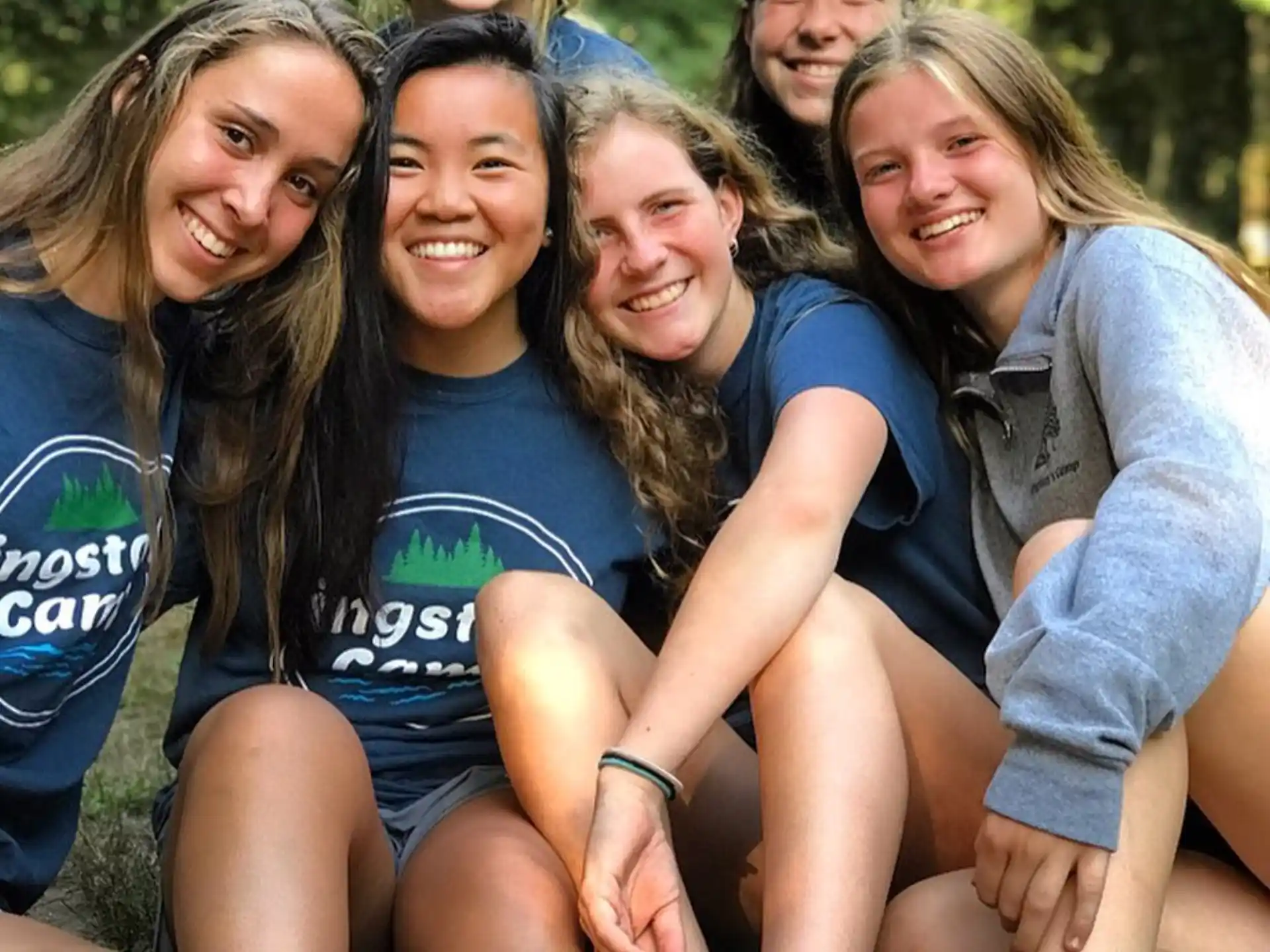 a group of girls posing for a photo