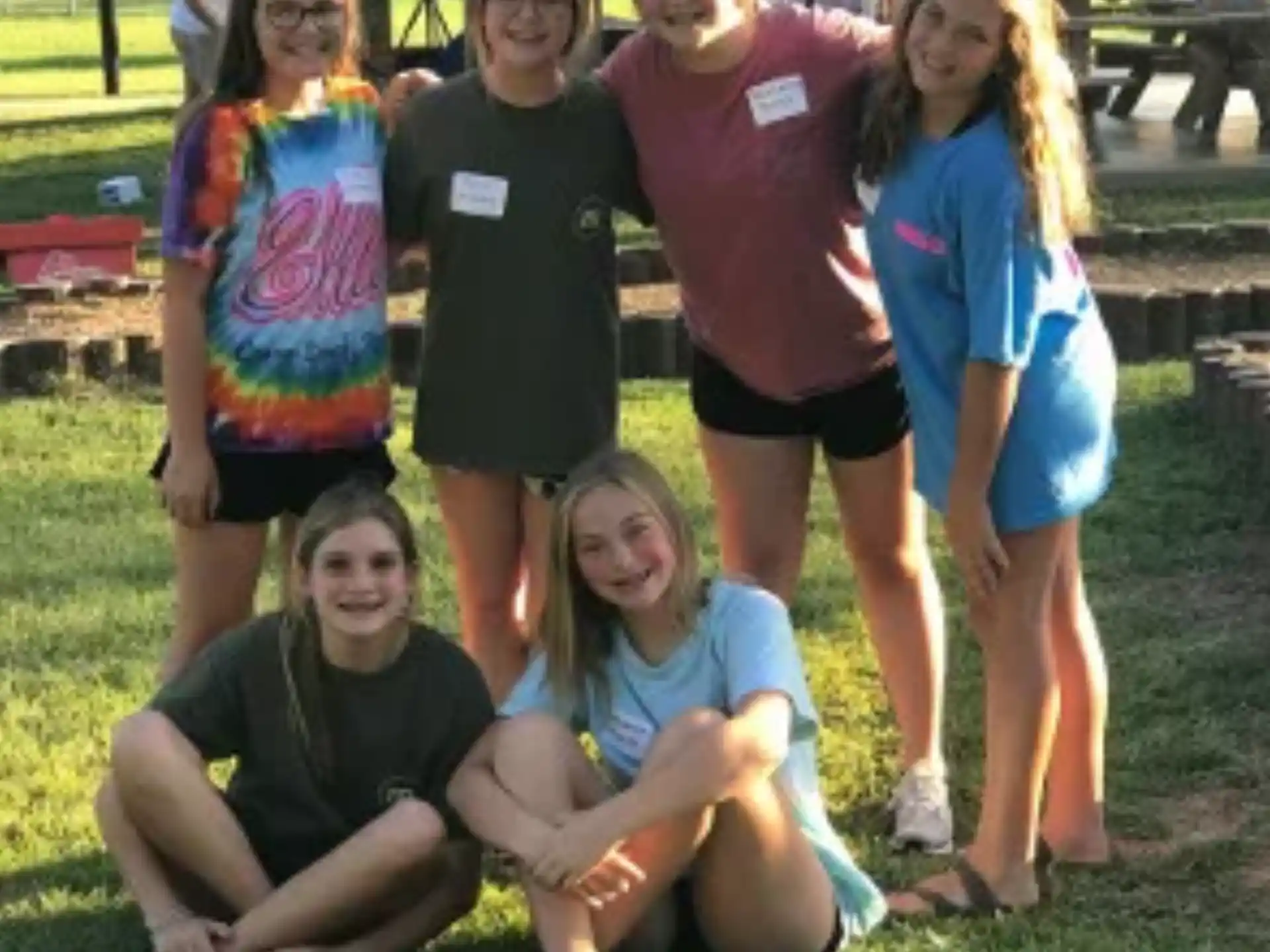a group of people posing for a photo