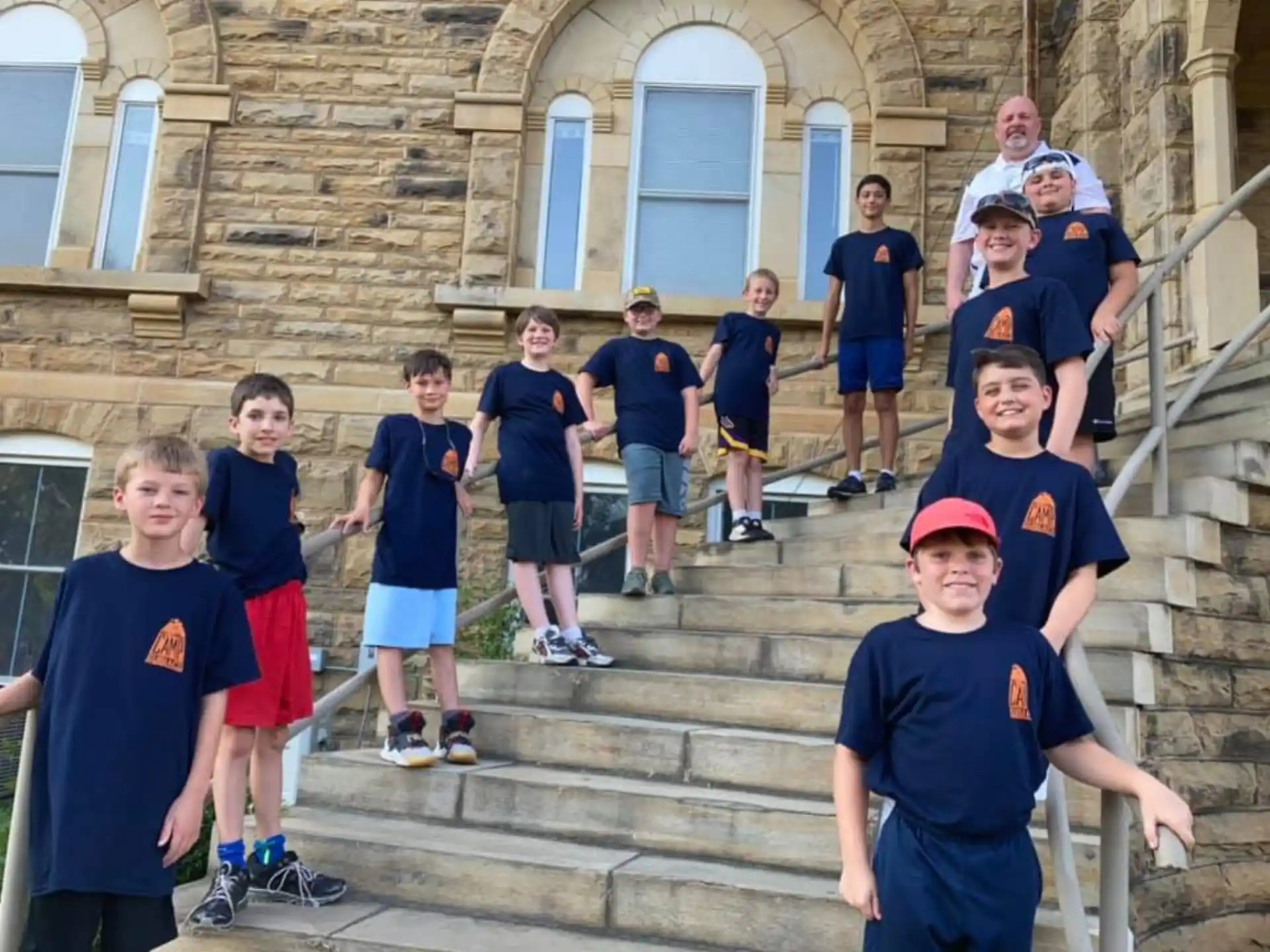 a group of people standing on stairs