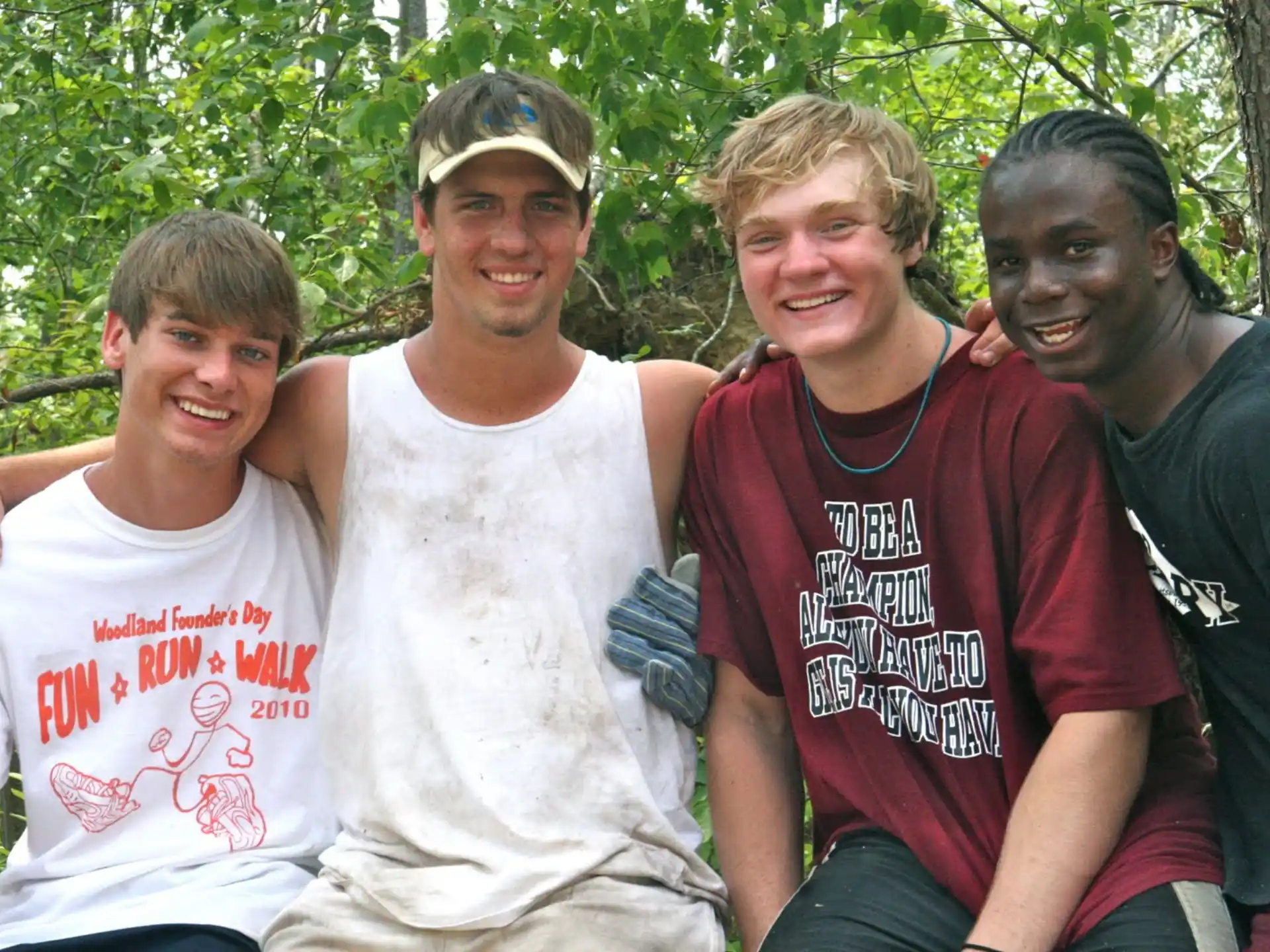 a group of men posing for a photo