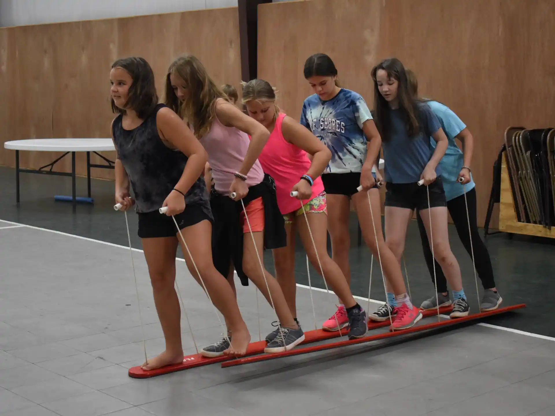 a group of women in a gym