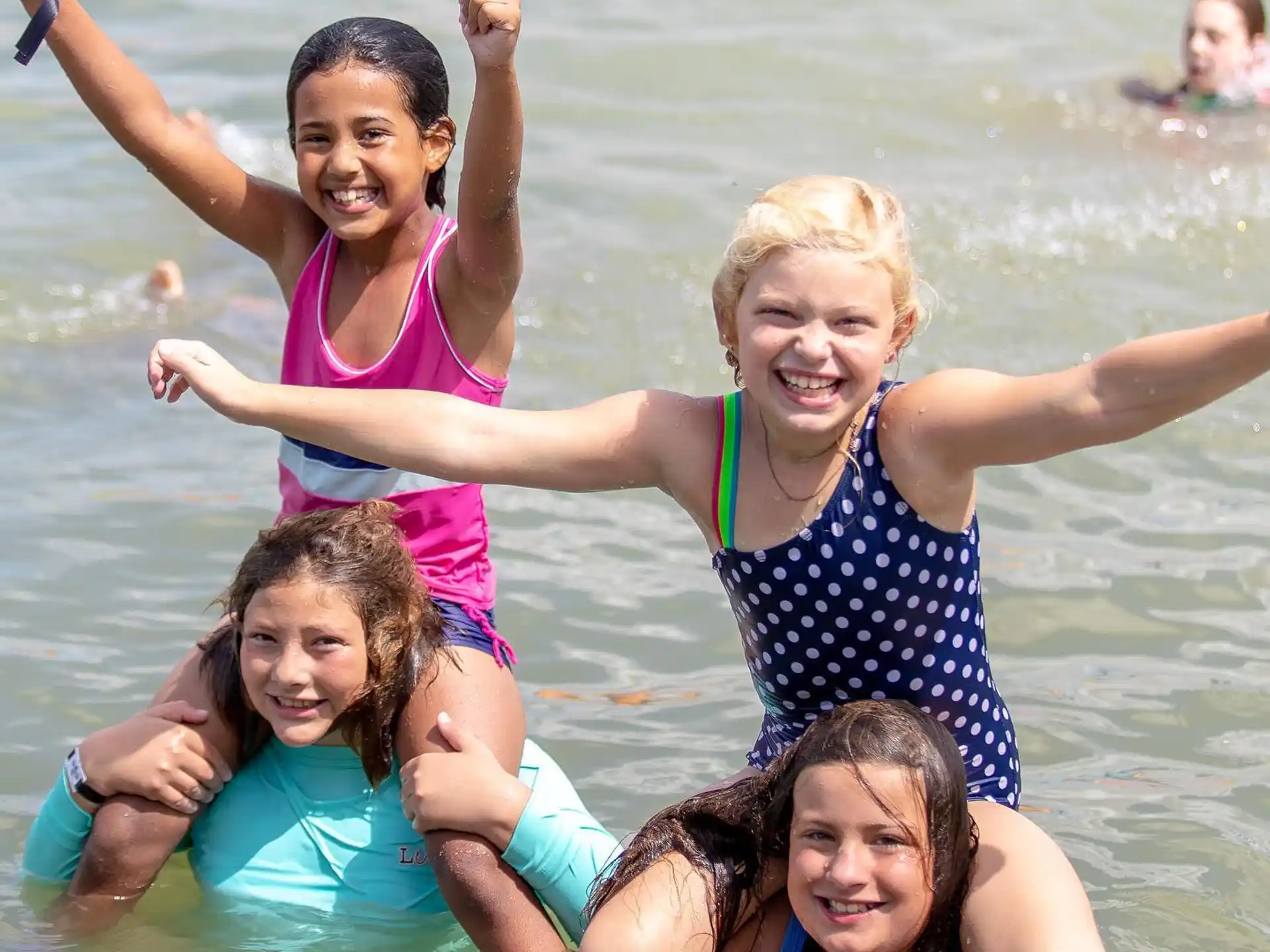 a group of women in the water