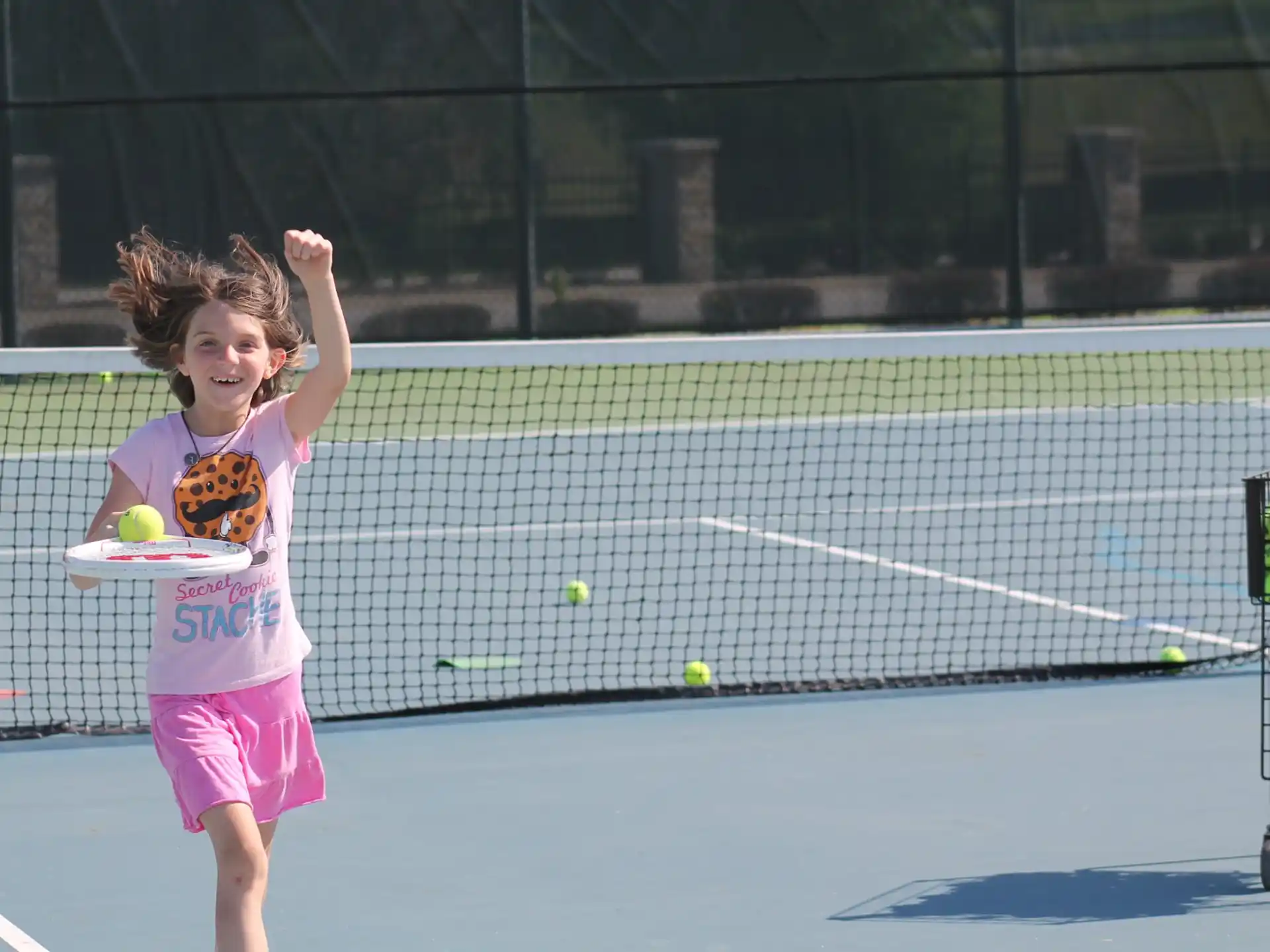 a girl playing tennis
