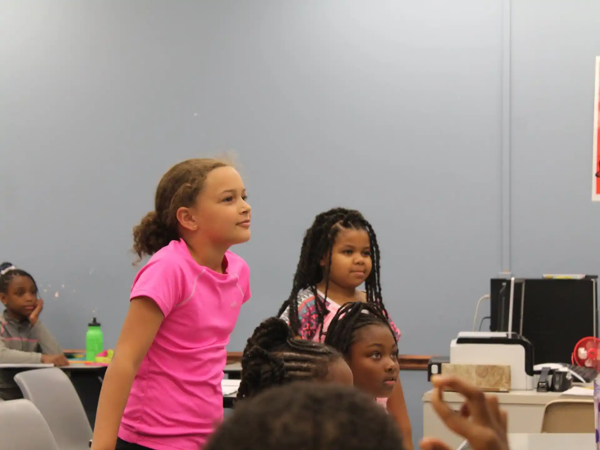 a group of people in a classroom