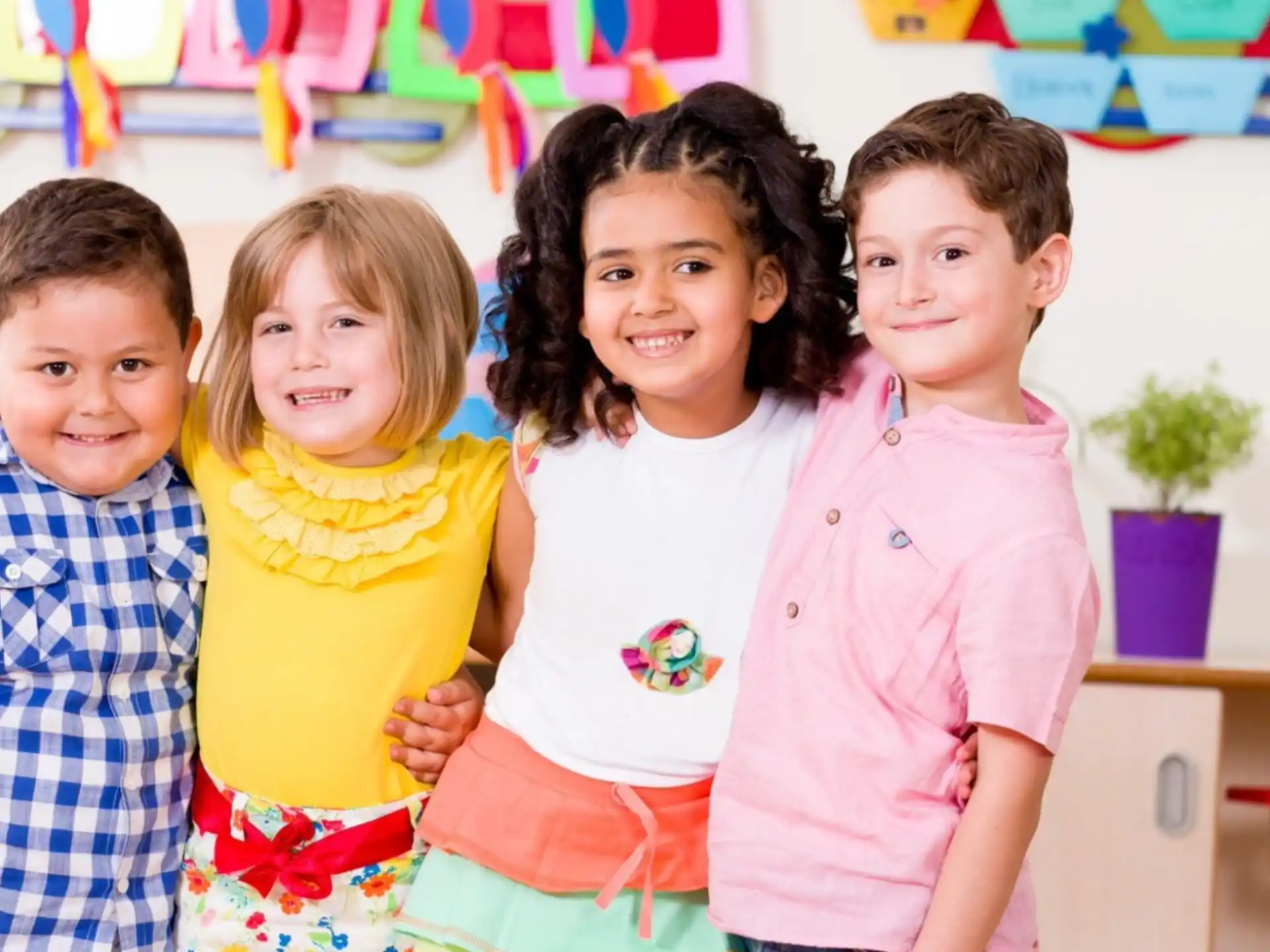 a group of children posing for a photo