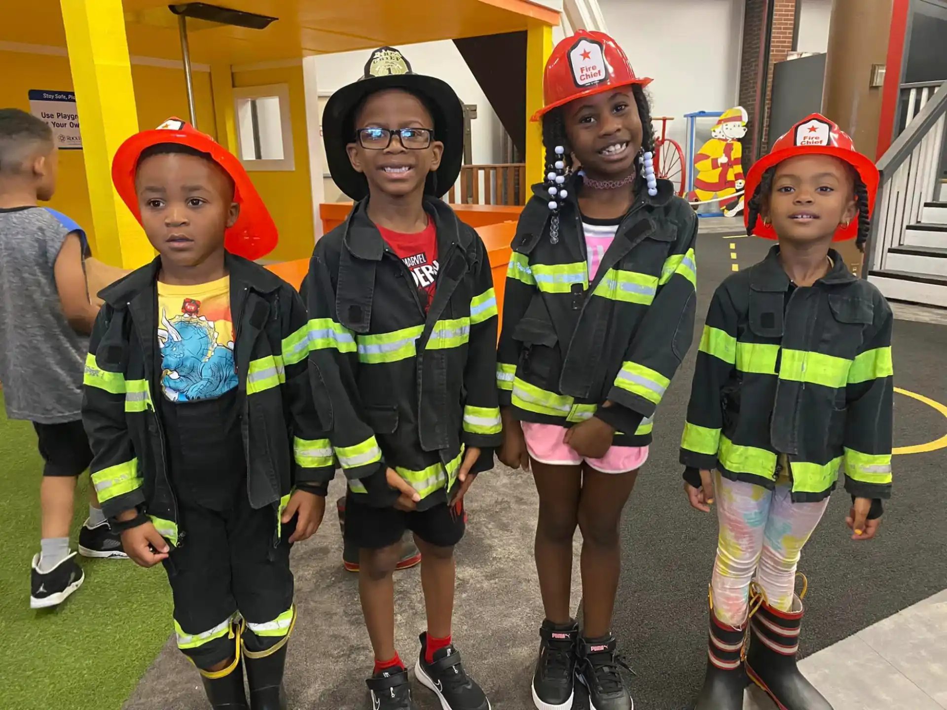a group of children in clothing