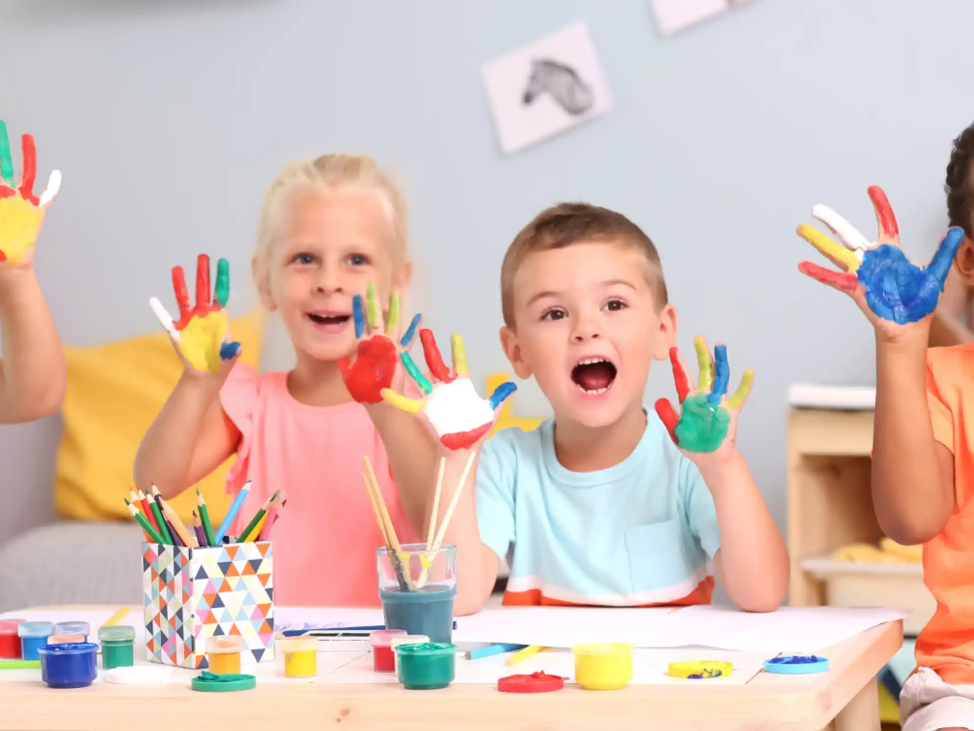 a group of kids with toothbrushes in their mouths