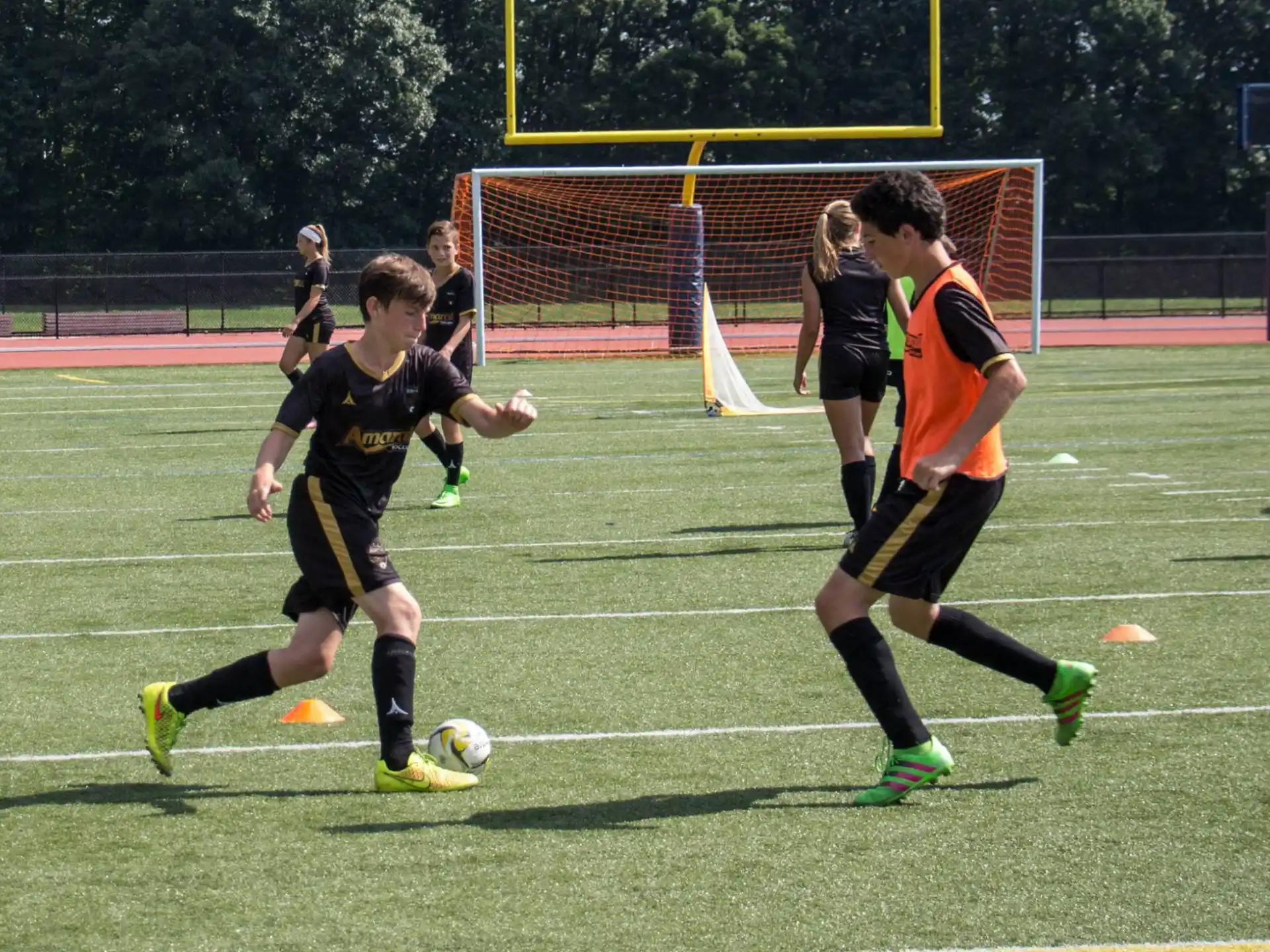 a group of people play football