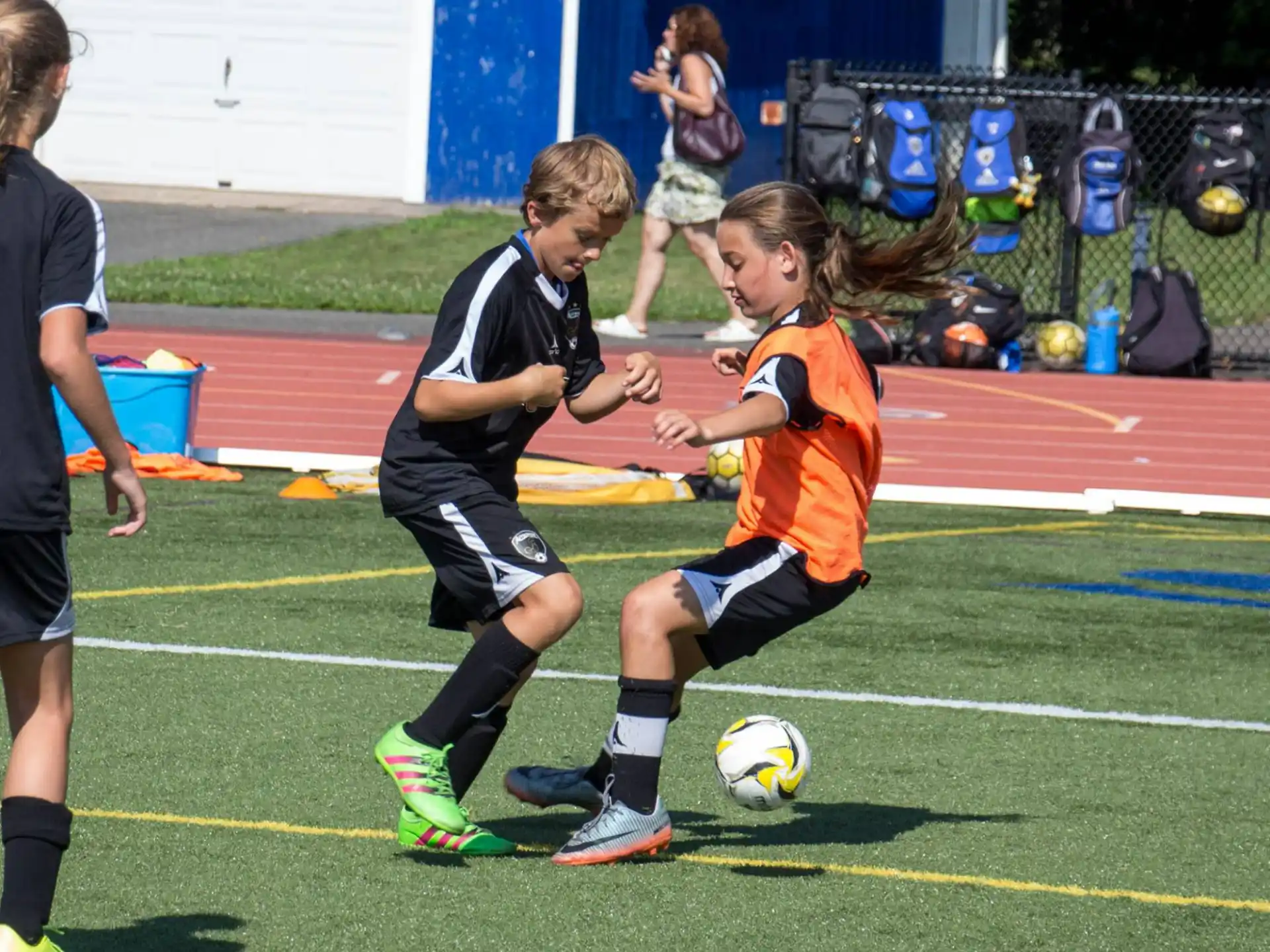 kids playing football on a field