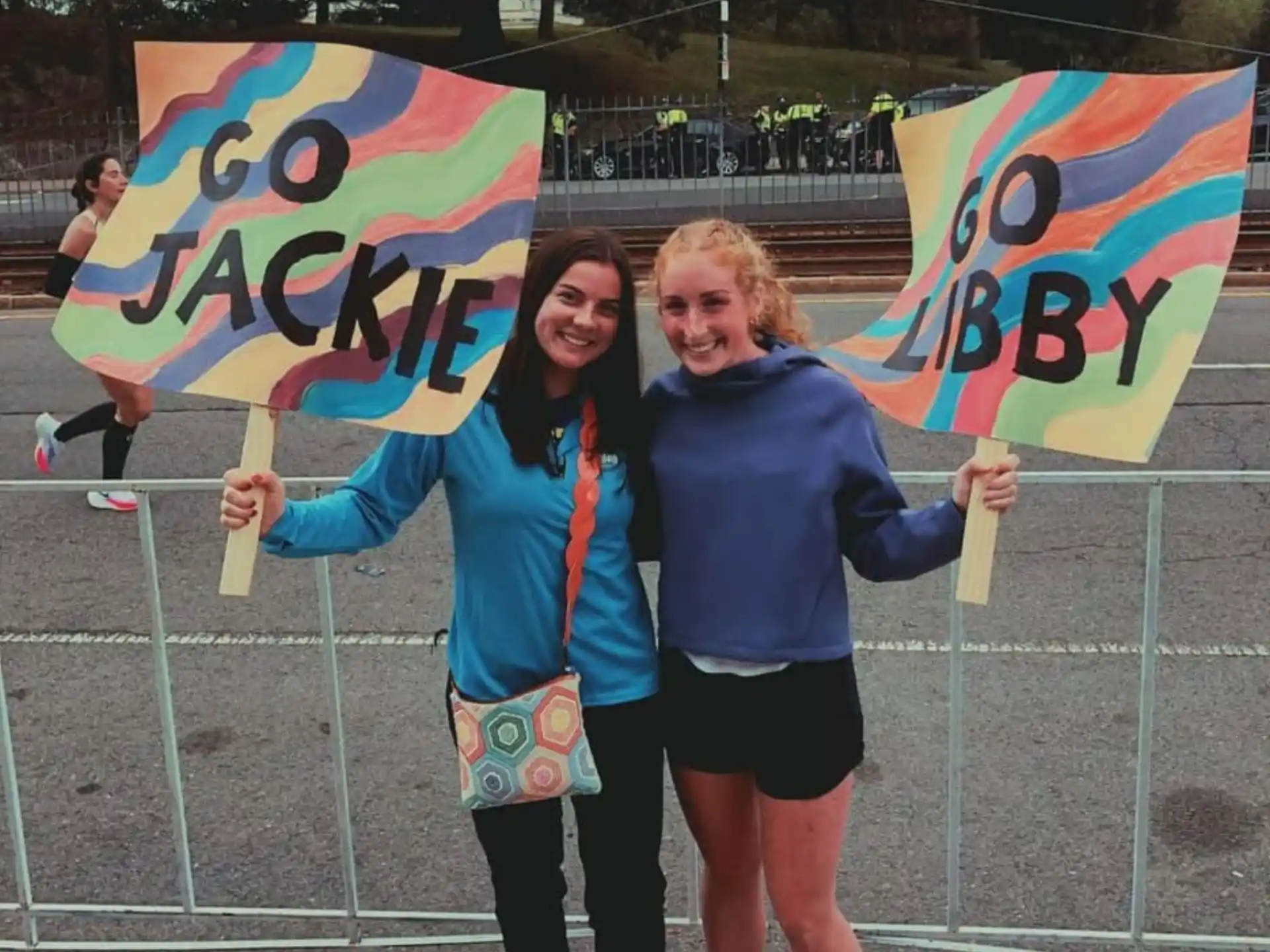 two women holding flags