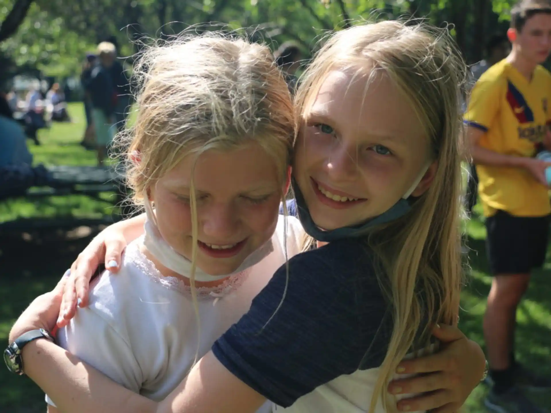 a couple of girls posing for the camera