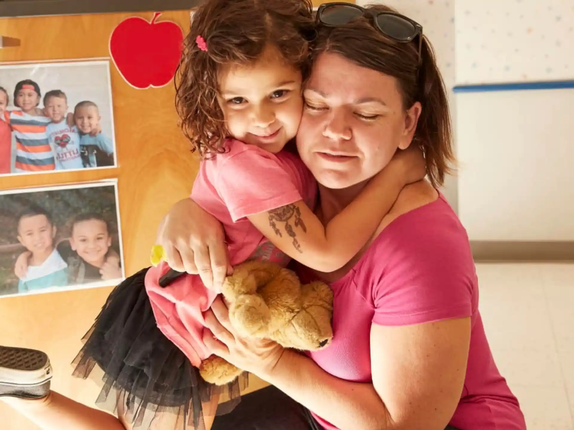 a person holding a baby