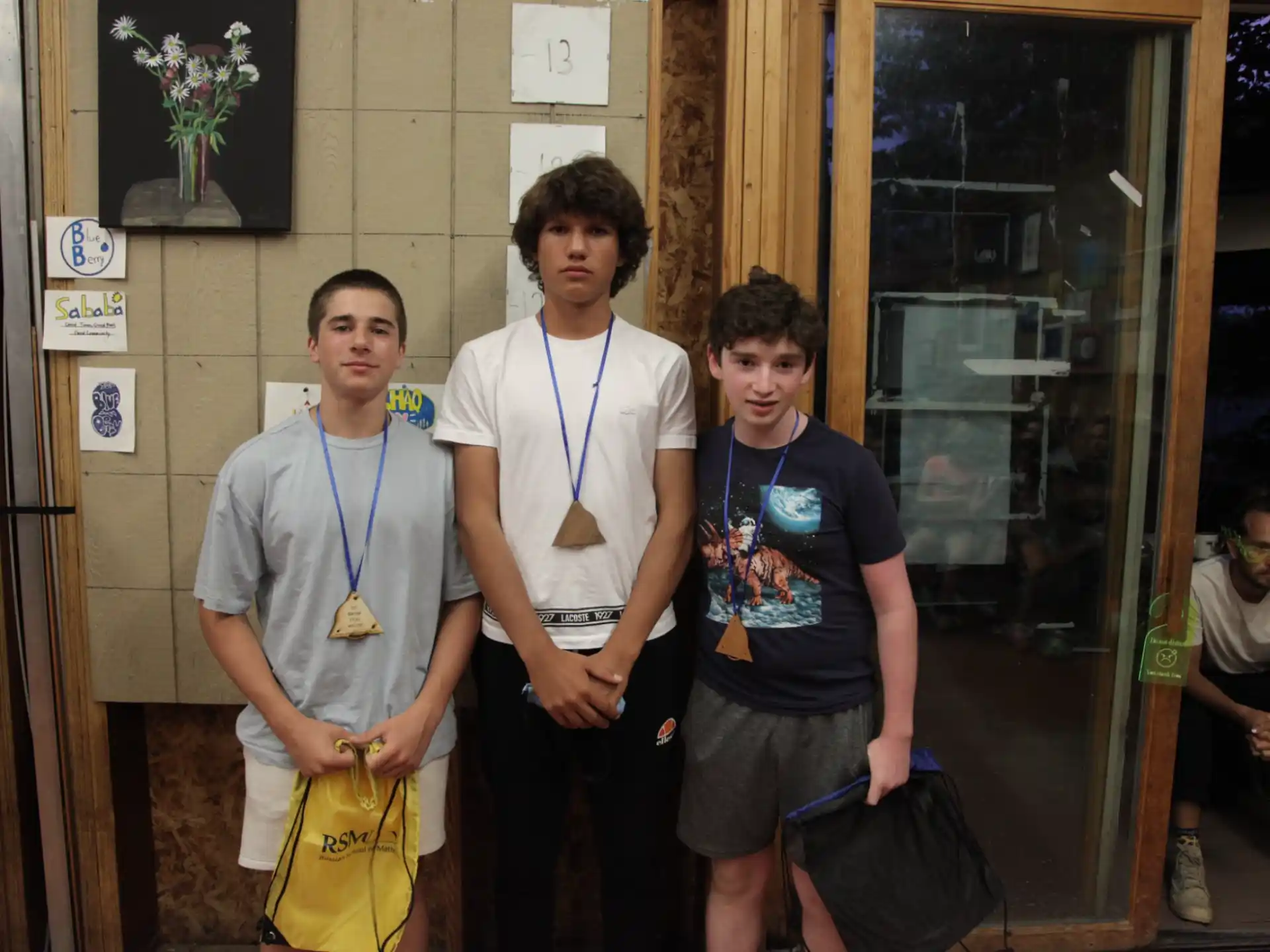 a group of men posing for a photo