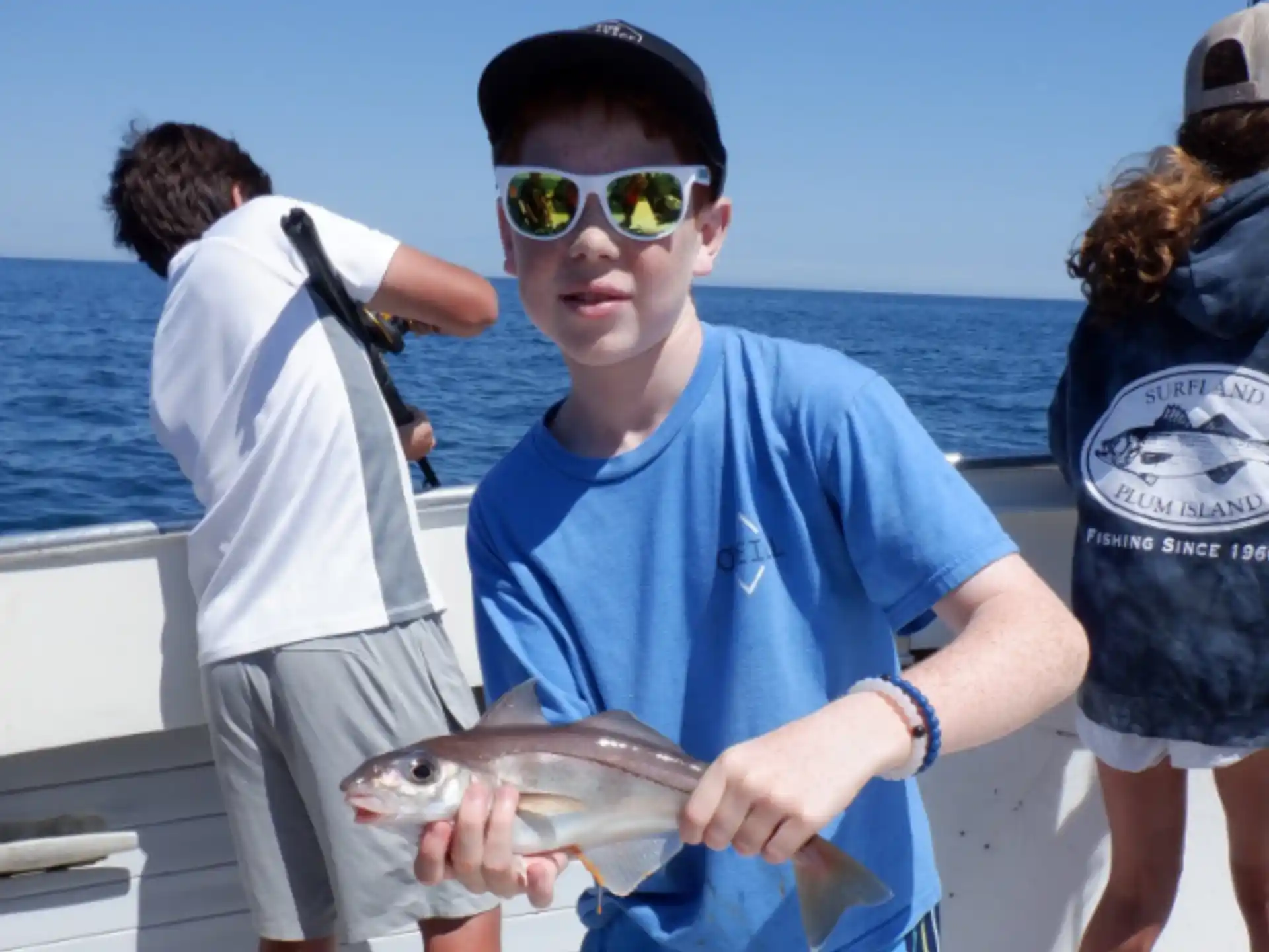 a person holding a fish