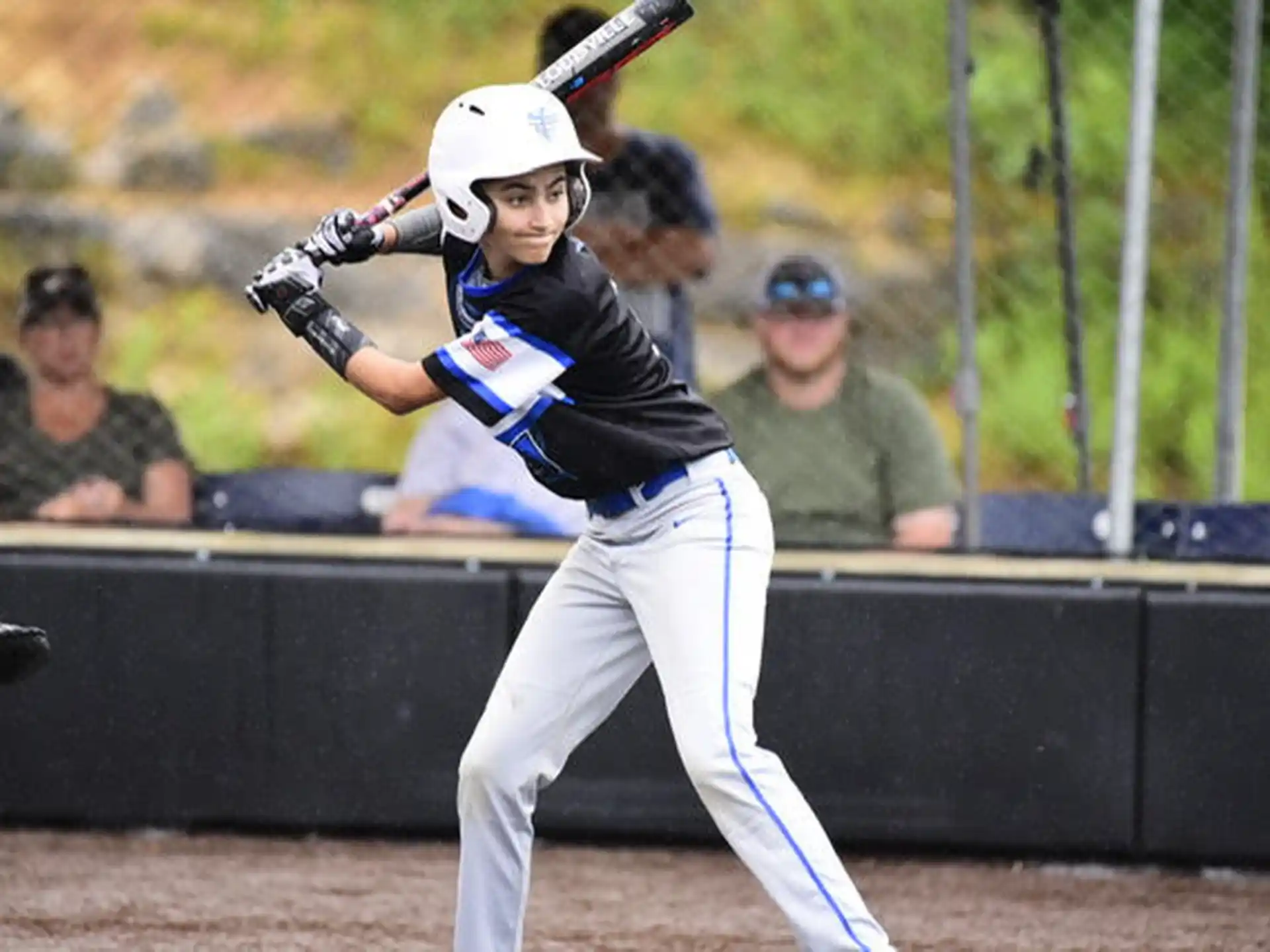 a baseball player swinging a bat