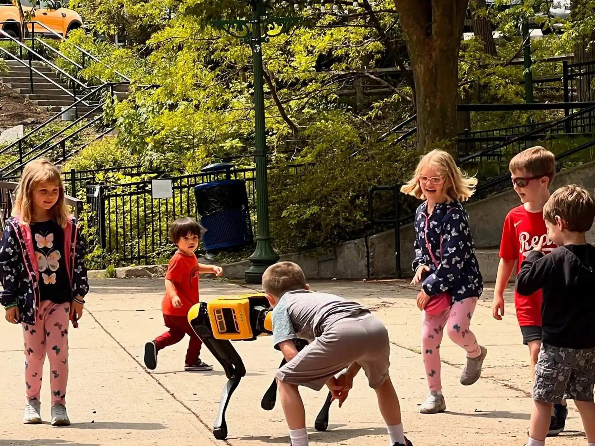 a group of children playing with a toy