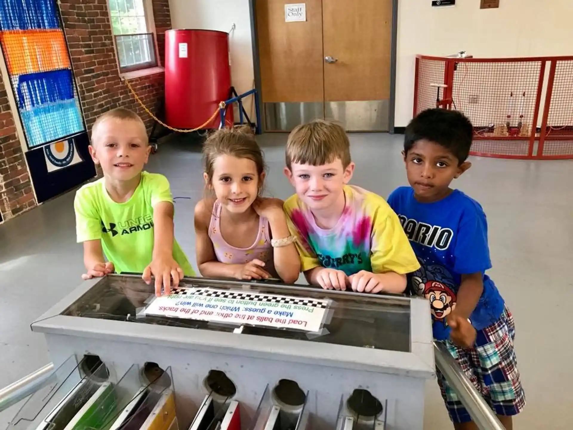 a group of children in a pool