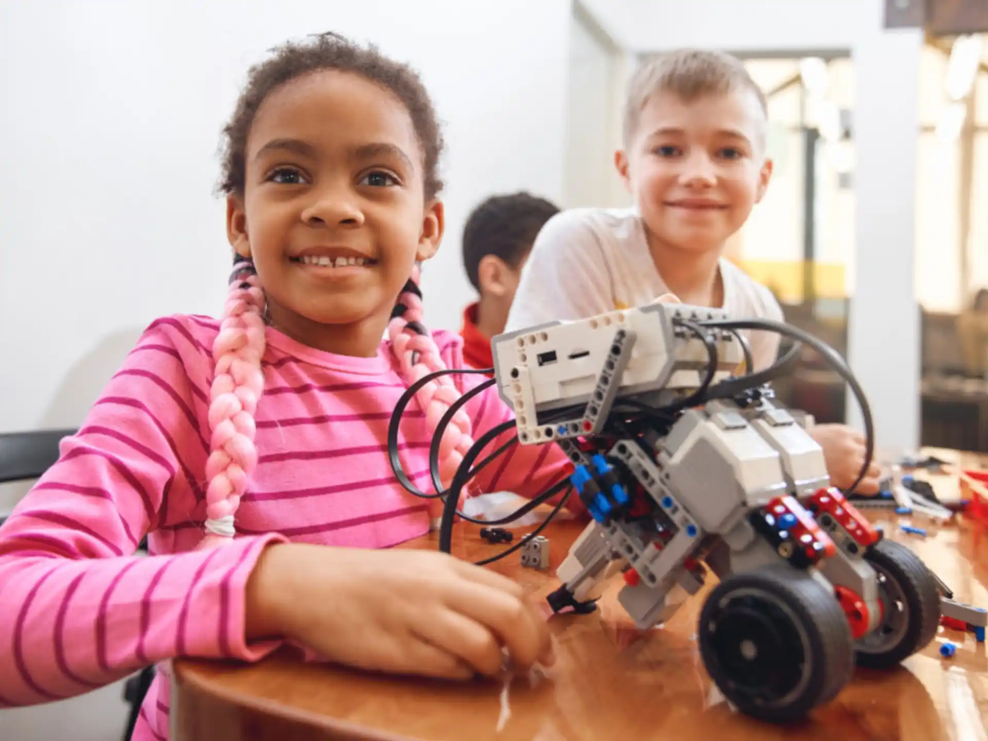 a few children working on a project
